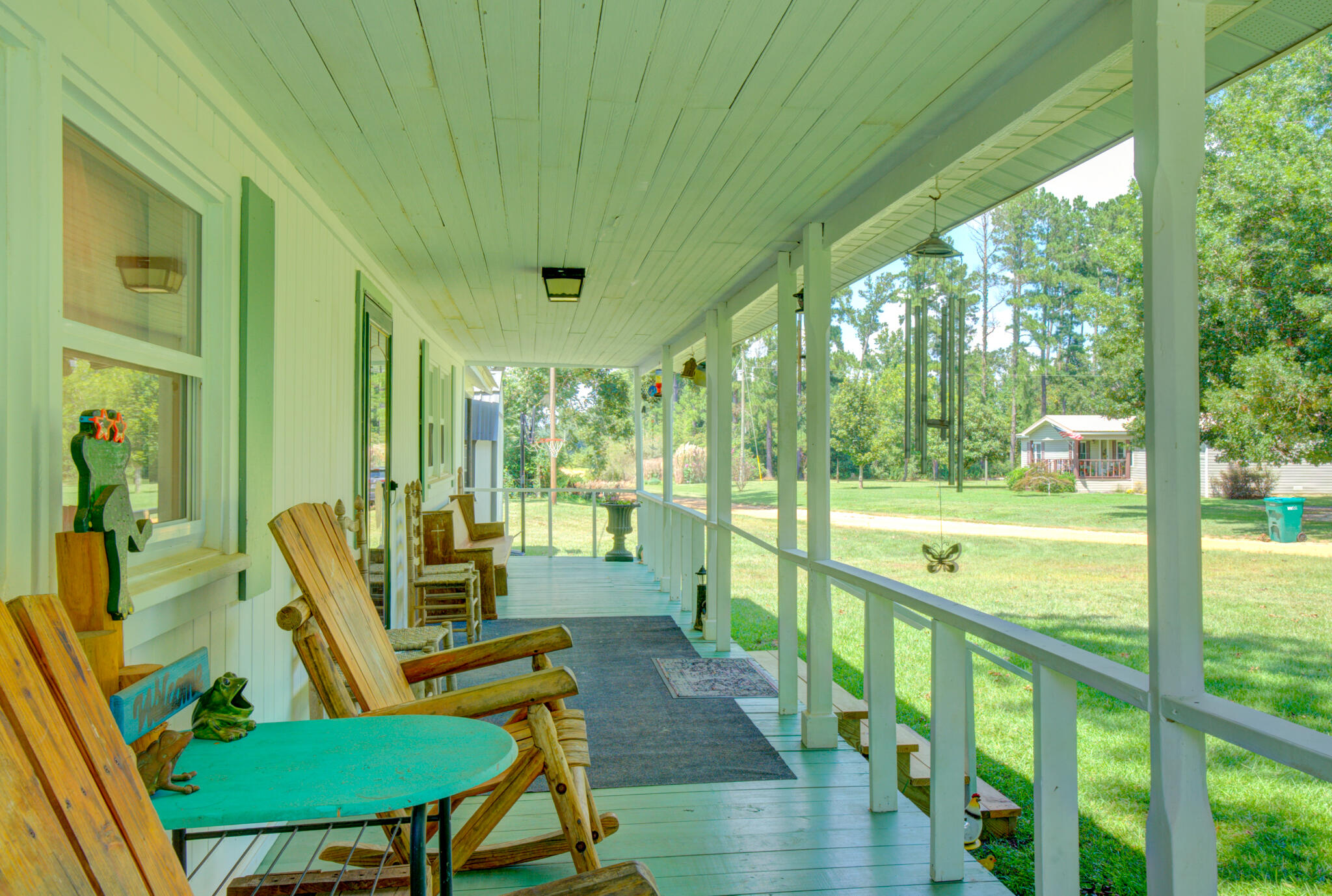 4135 Cliff Road Graceville, FL 32440 - Photo 27 of 40 a view of swimming pool with outdoor seating