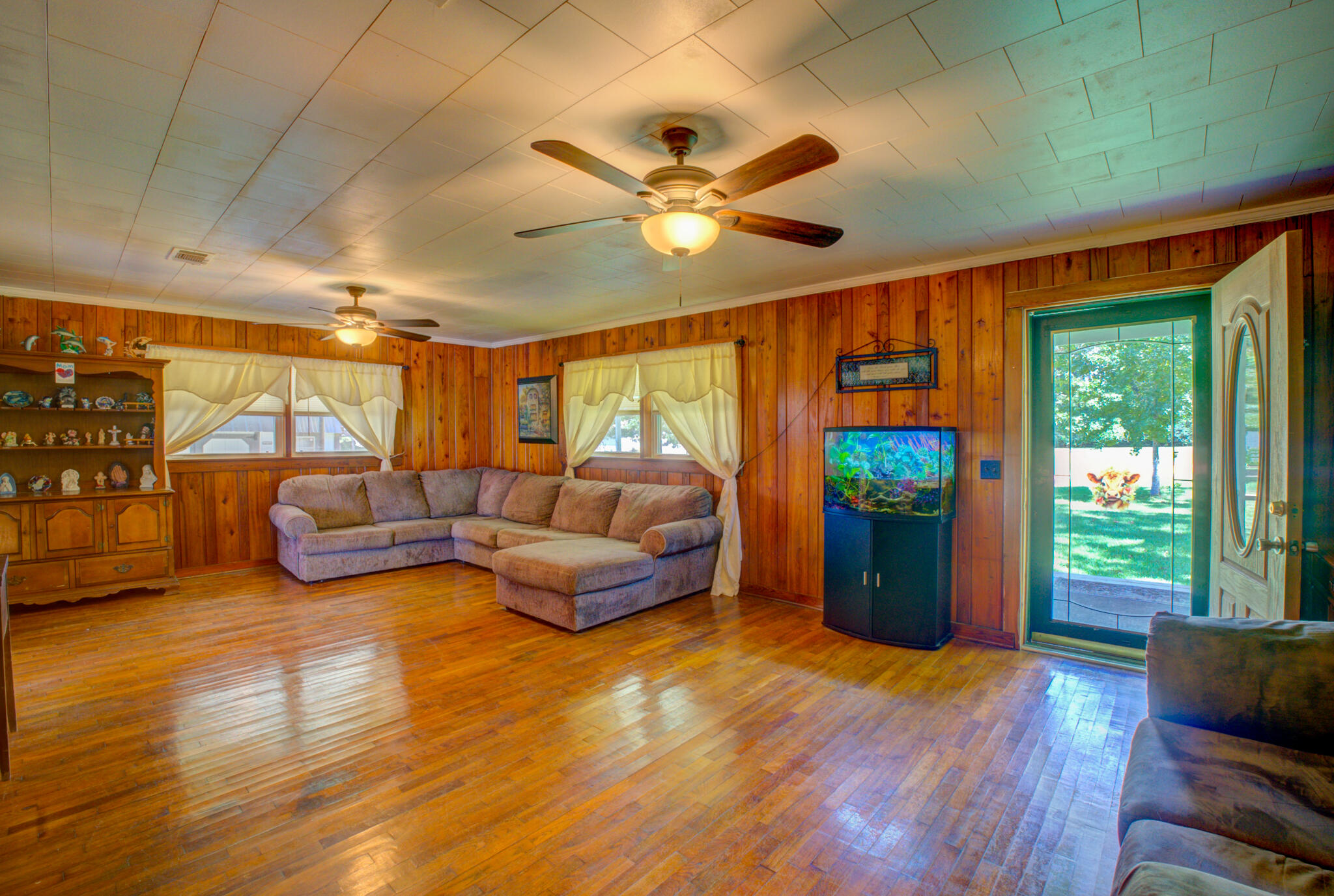 4135 Cliff Road Graceville, FL 32440 - Photo 4 of 40 a living room with furniture and a large window