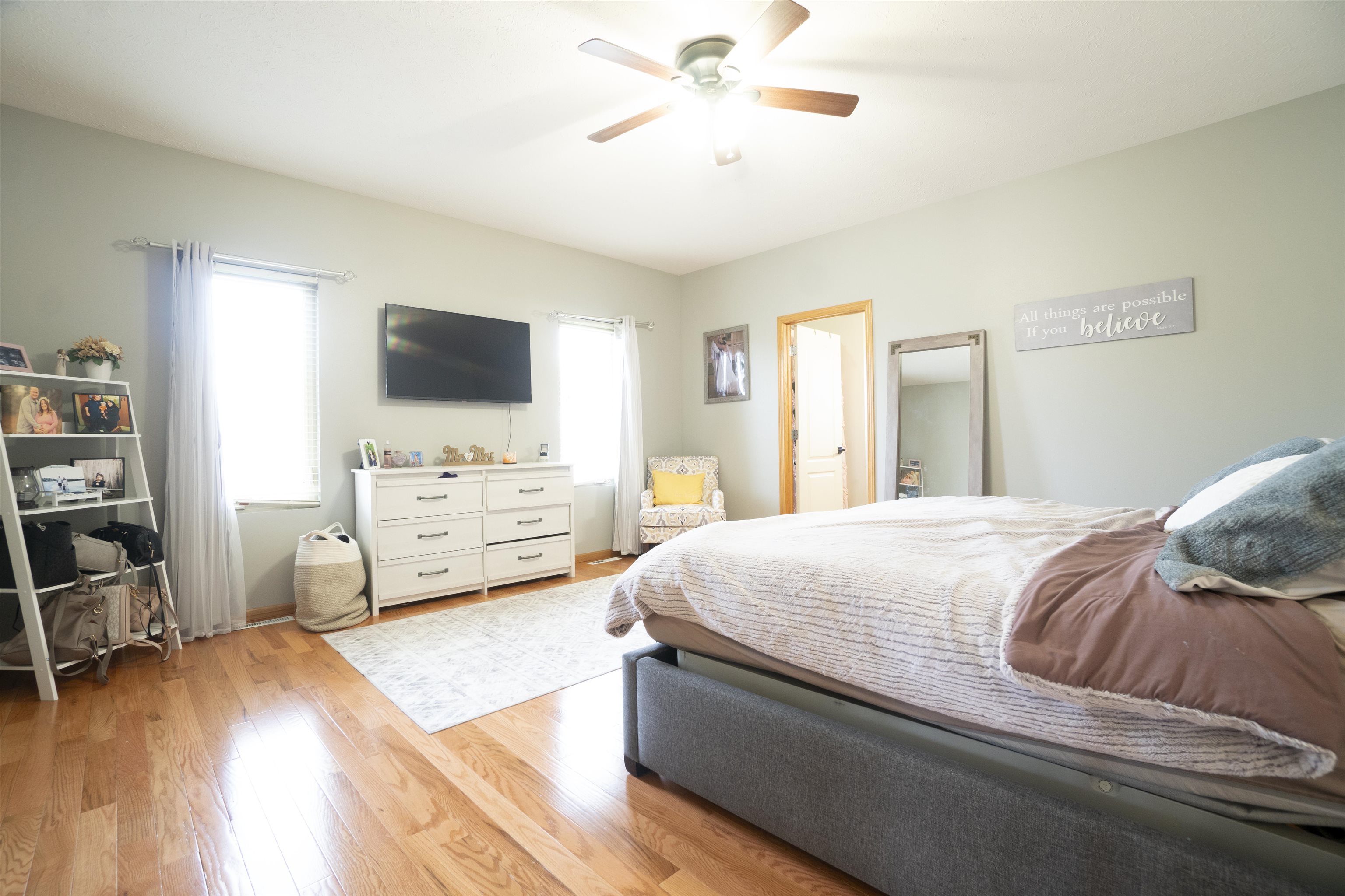 3271 North Silver Ridge Drive Oregon, IL 61061 - Photo 21 of 45 a bedroom with a bed and a flat screen tv