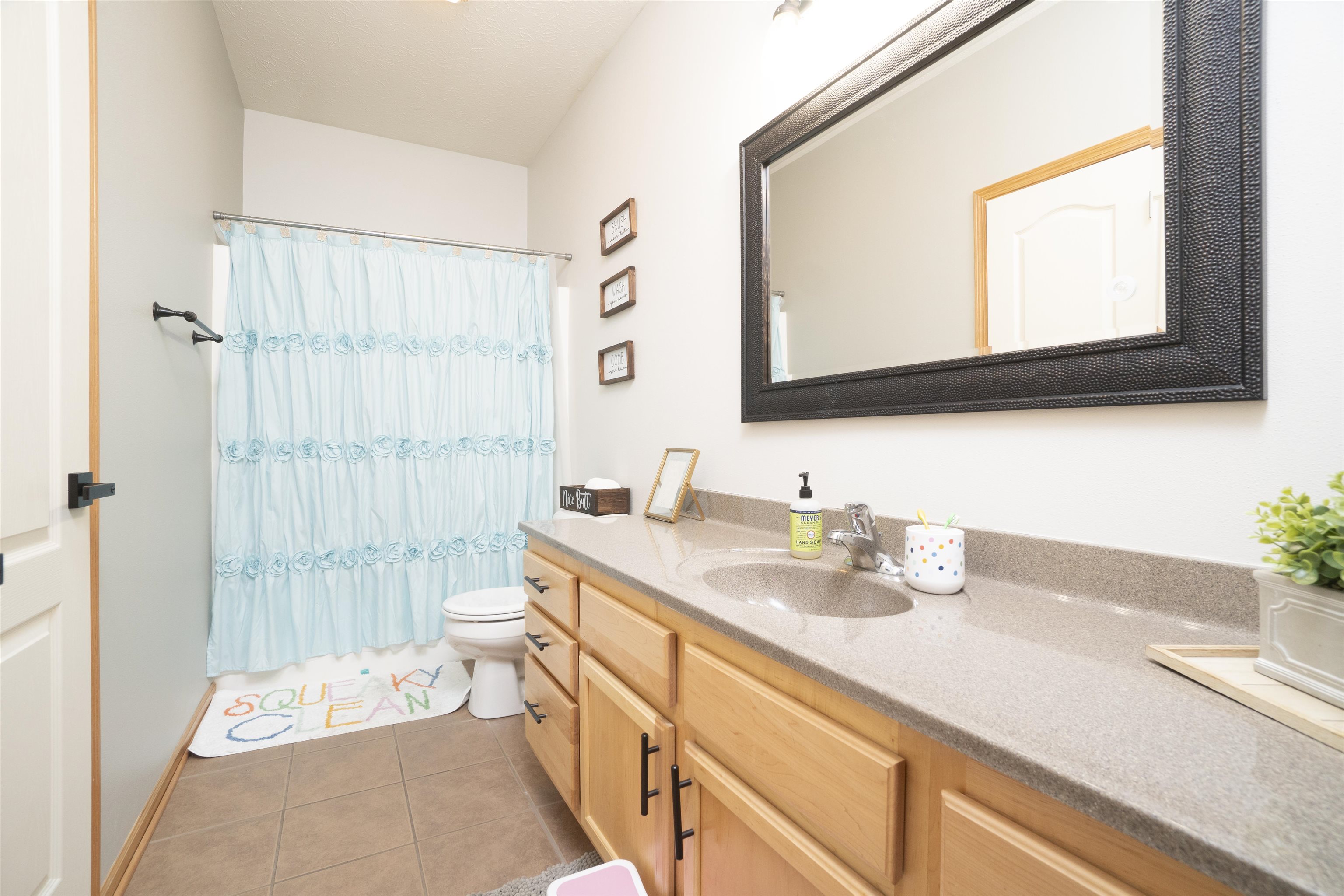 3271 North Silver Ridge Drive Oregon, IL 61061 - Photo 22 of 45 a bathroom with a sink a toilet and a mirror