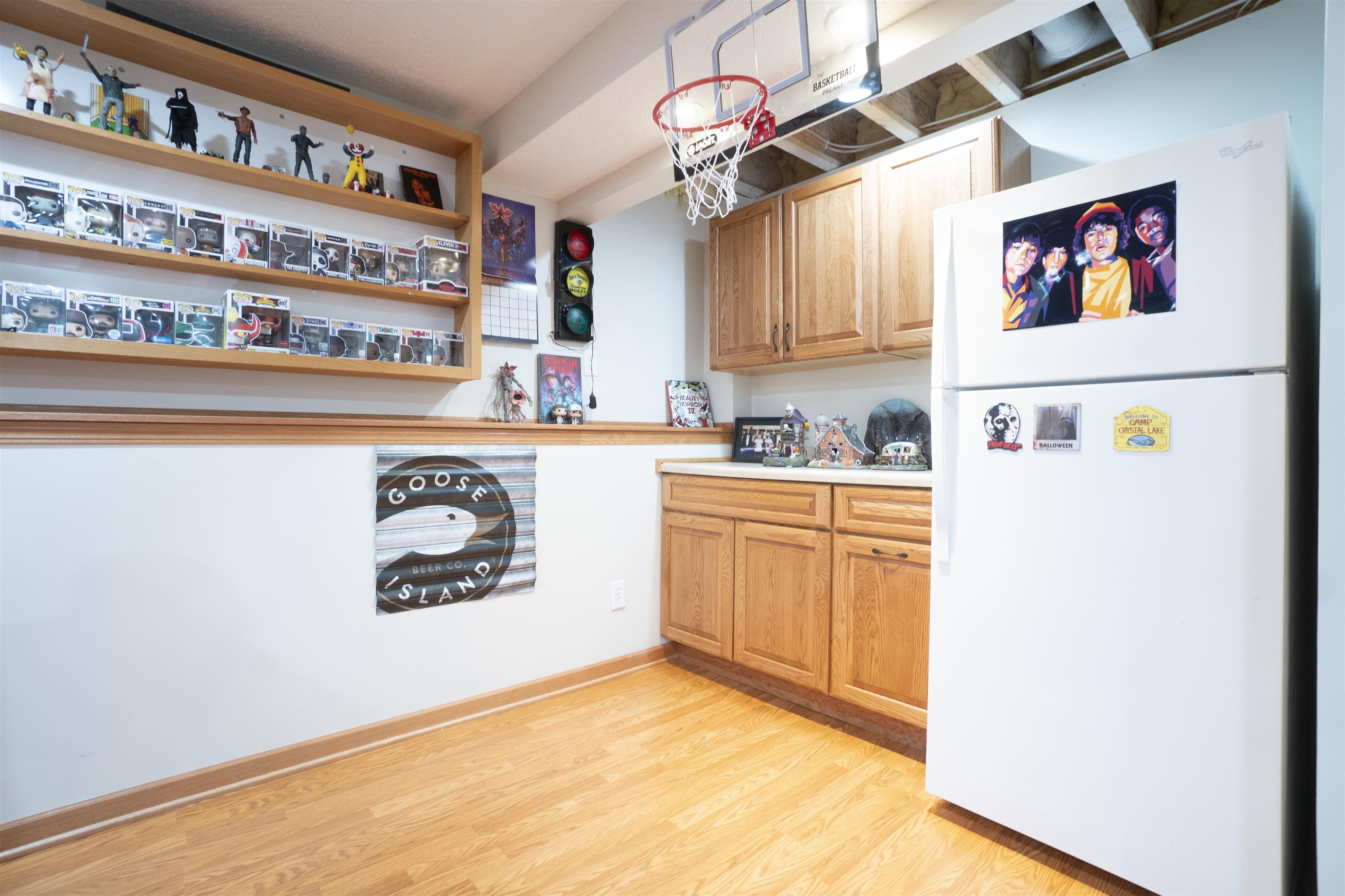 3271 North Silver Ridge Drive Oregon, IL 61061 - Photo 30 of 45 a kitchen with a refrigerator and a sink