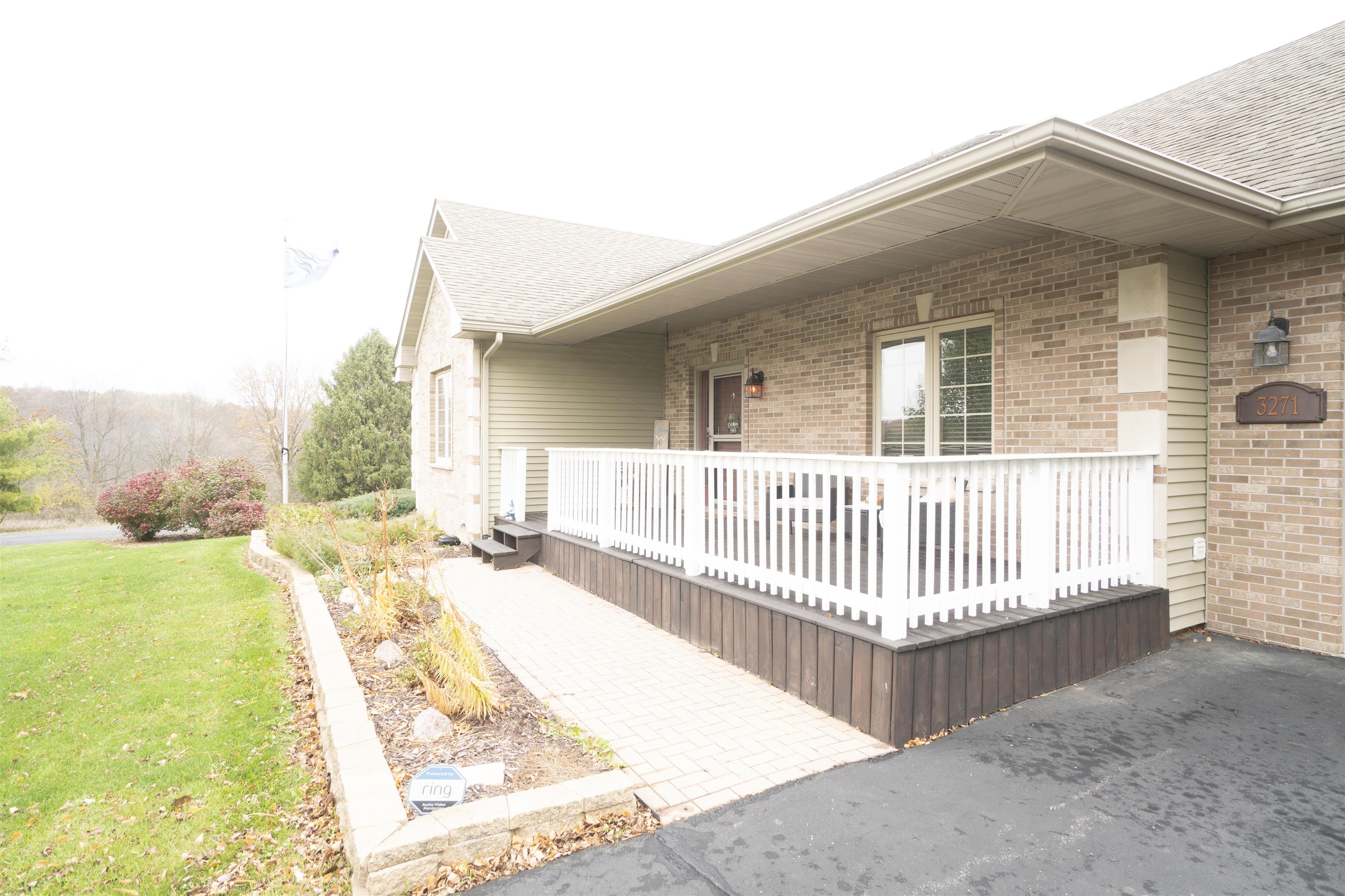 3271 North Silver Ridge Drive Oregon, IL 61061 - Photo 38 of 45 a view of a house with a wooden deck