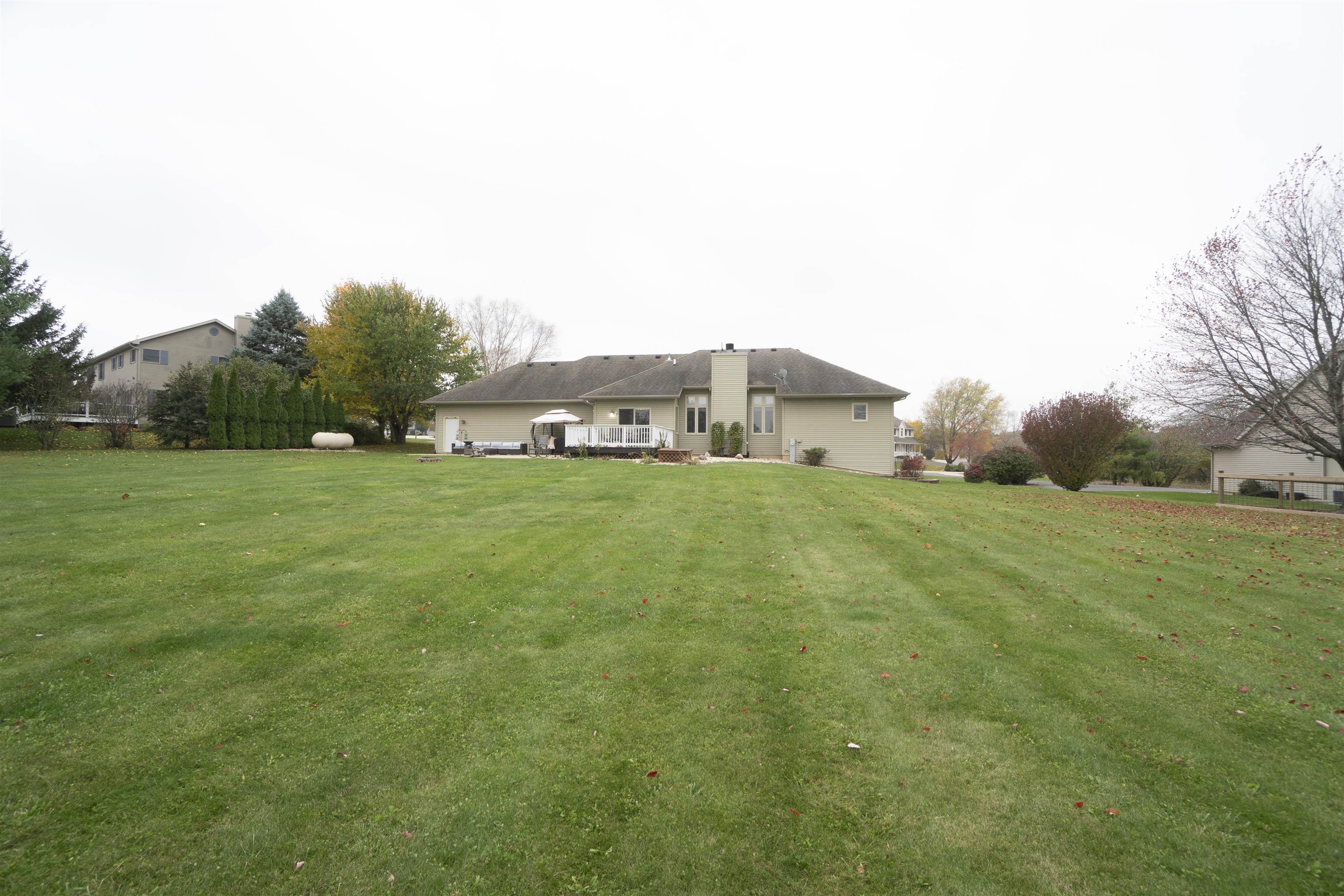 3271 North Silver Ridge Drive Oregon, IL 61061 - Photo 40 of 45 a view of a field of grass and trees