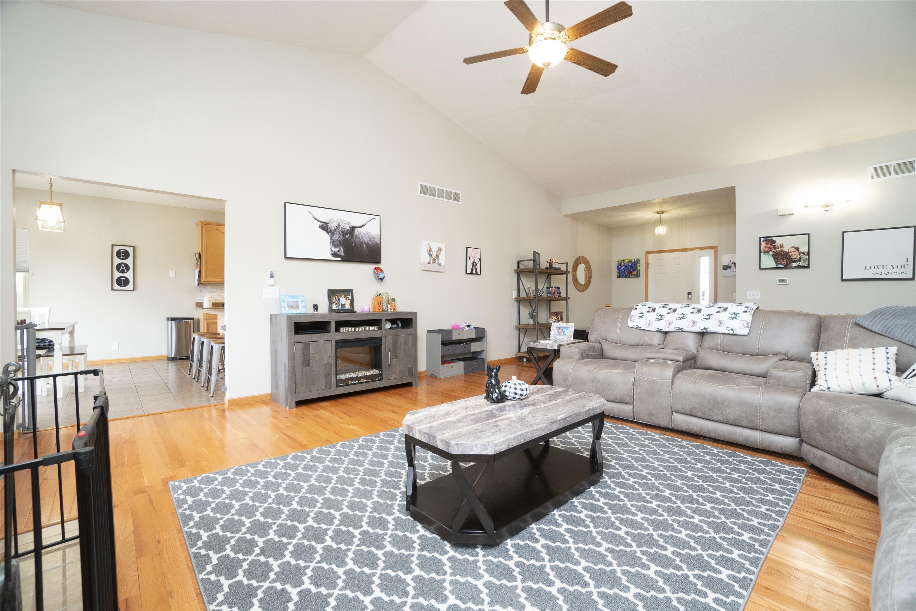 3271 North Silver Ridge Drive Oregon, IL 61061 - Photo 9 of 45 a living room with furniture and a wooden floor