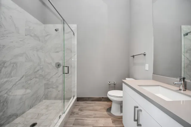 a room with lots of furniture and a large window