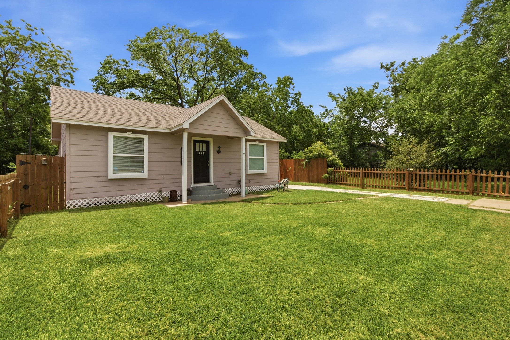 306 Center Street Pasadena, TX 77506 - Photo 3 of 31 a view of a house with backyard and garden