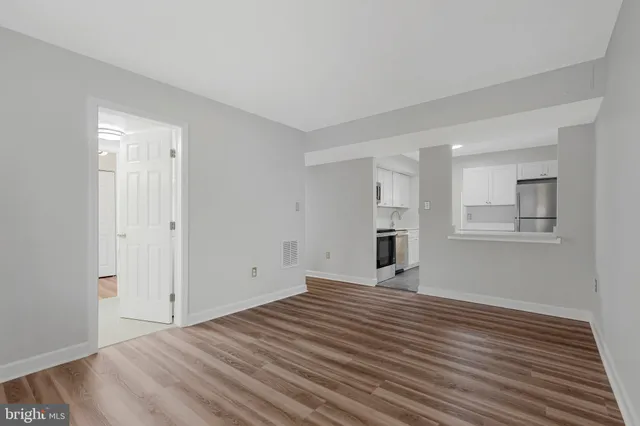 a view of a yard with a large tree