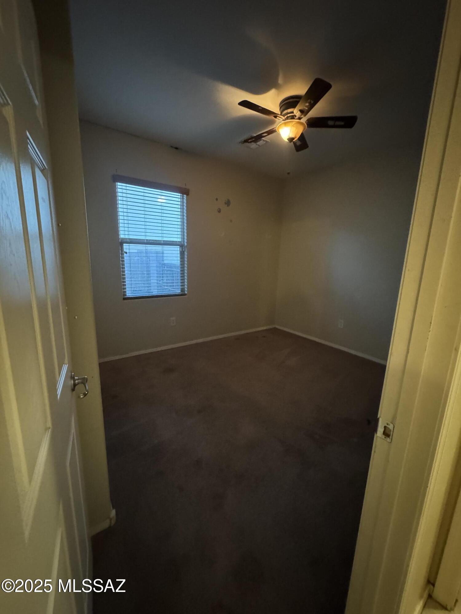 8697 West Denstone Road Marana, AZ 85653 - Photo 7 of 21 Bigger Room with ceiling fan