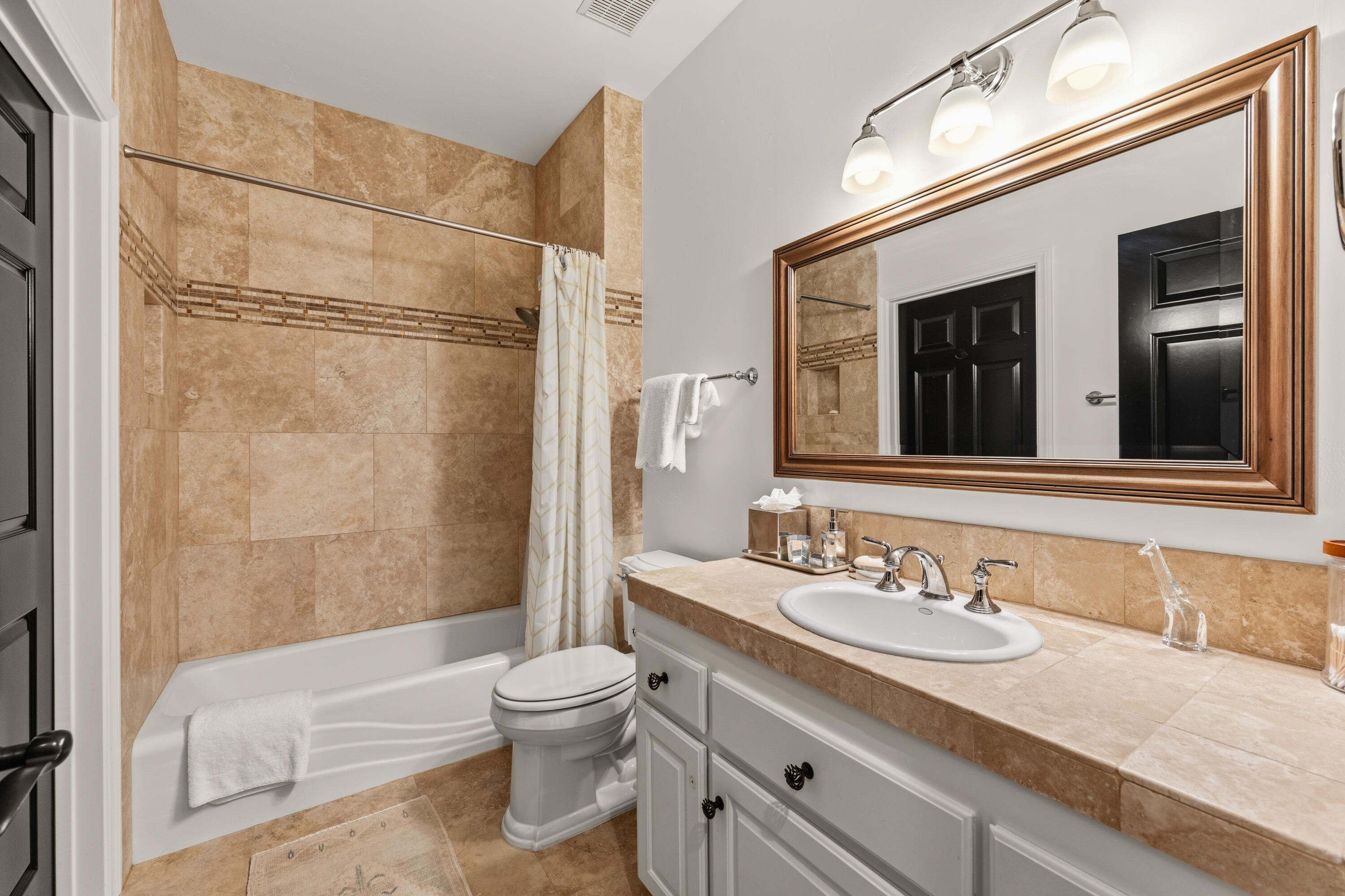 2502 Pepper Tree Ranch Road Santa Ynez, CA 93460 - Photo 18 of 32 a bathroom with a granite countertop sink toilet and shower