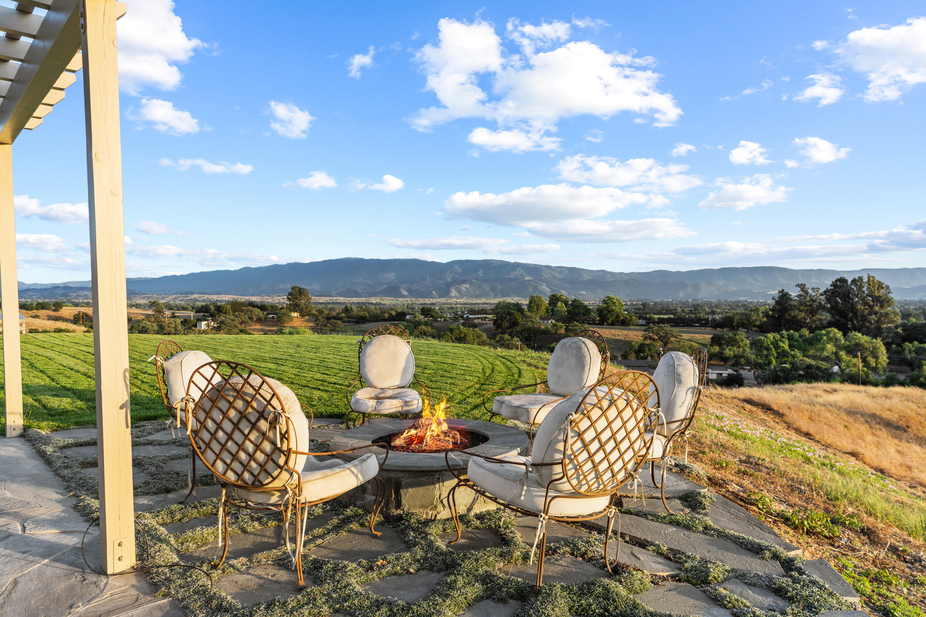 2502 Pepper Tree Ranch Road Santa Ynez, CA 93460 - Photo 25 of 32 a view of a patio with furniture and a yard