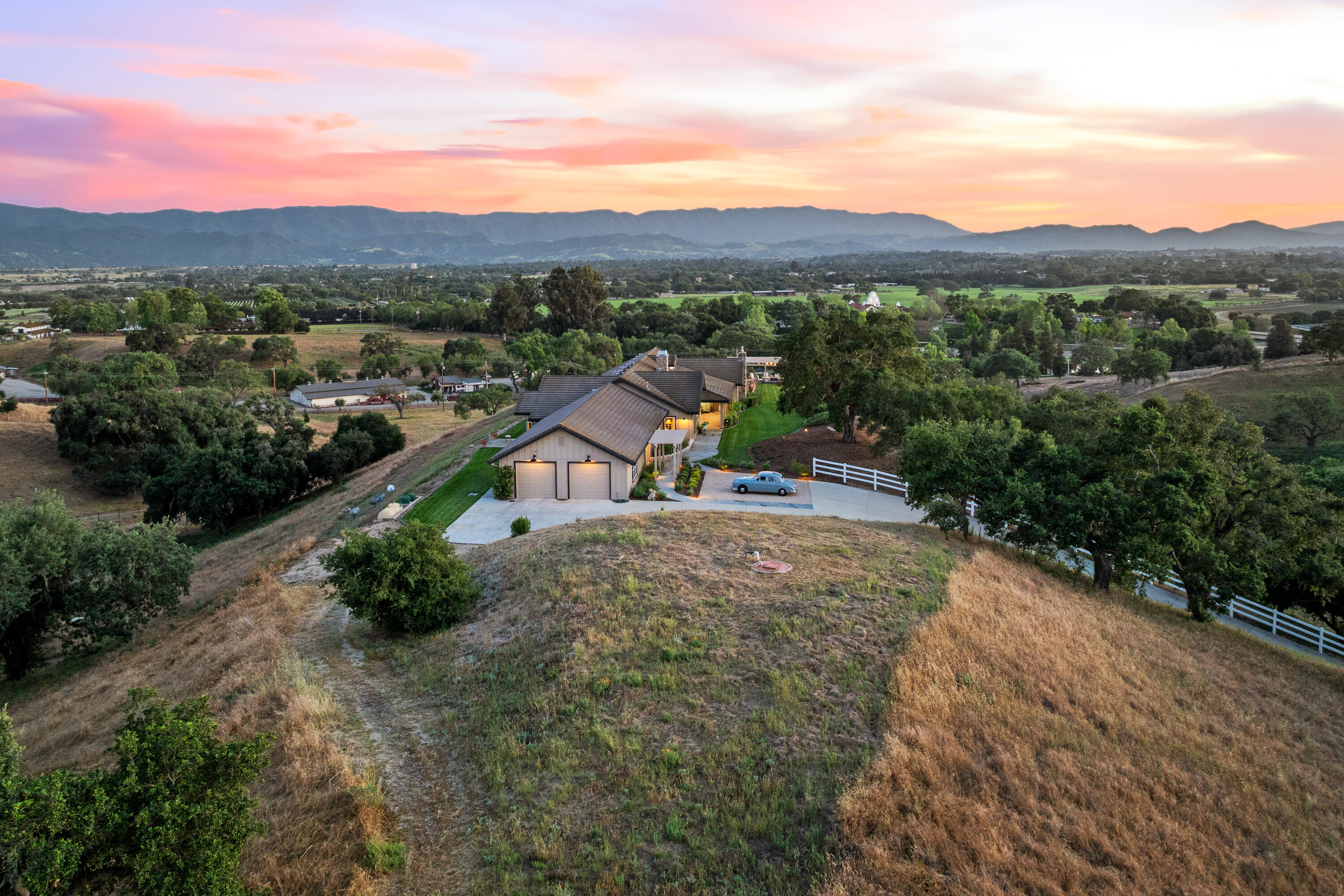 2502 Pepper Tree Ranch Road Santa Ynez, CA 93460 - Photo 29 of 32 a view of a city with sunset view