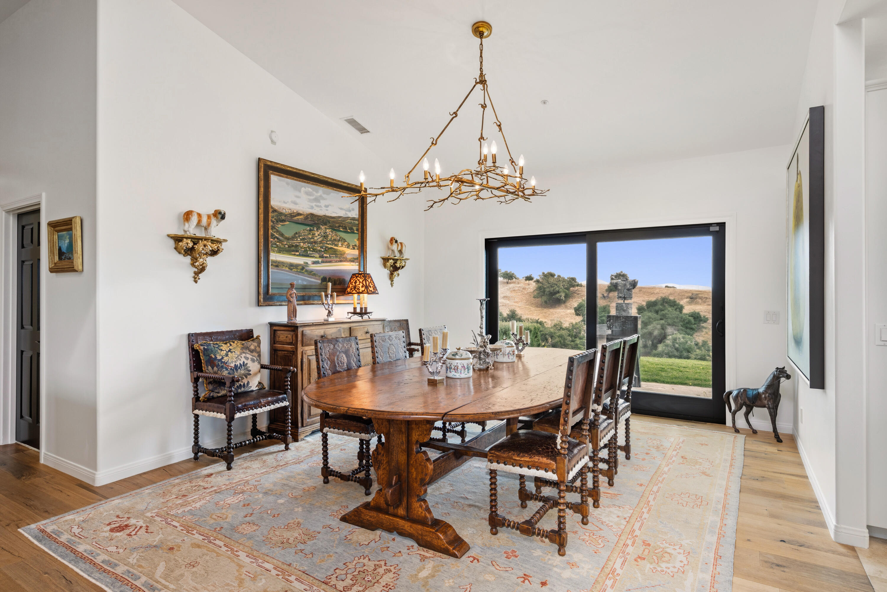 2502 Pepper Tree Ranch Road Santa Ynez, CA 93460 - Photo 9 of 32 a view of a dining room with furniture window and wooden floor