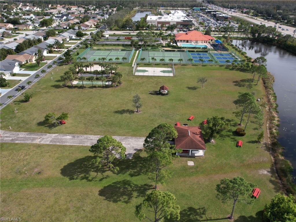 13243 Heather Ridge Loop Fort Myers, FL 33966 - Photo 31 of 34 an aerial view of residential houses with outdoor space