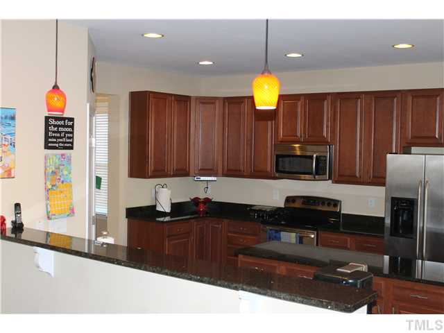 5802 St Agnes Way Raleigh, NC 27612 - Photo 5 of 25 Large island for food preparation.