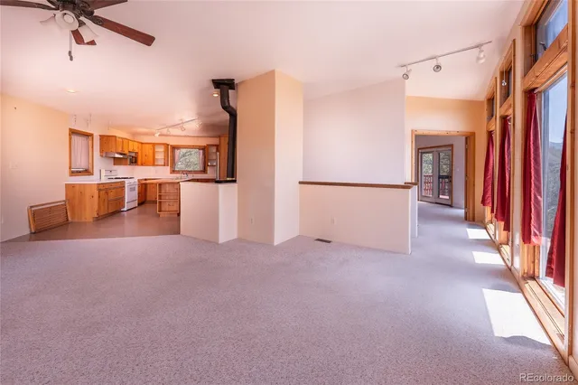 a view of a storage & utility room with windows