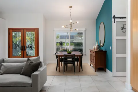 a view of a livingroom with furniture and window