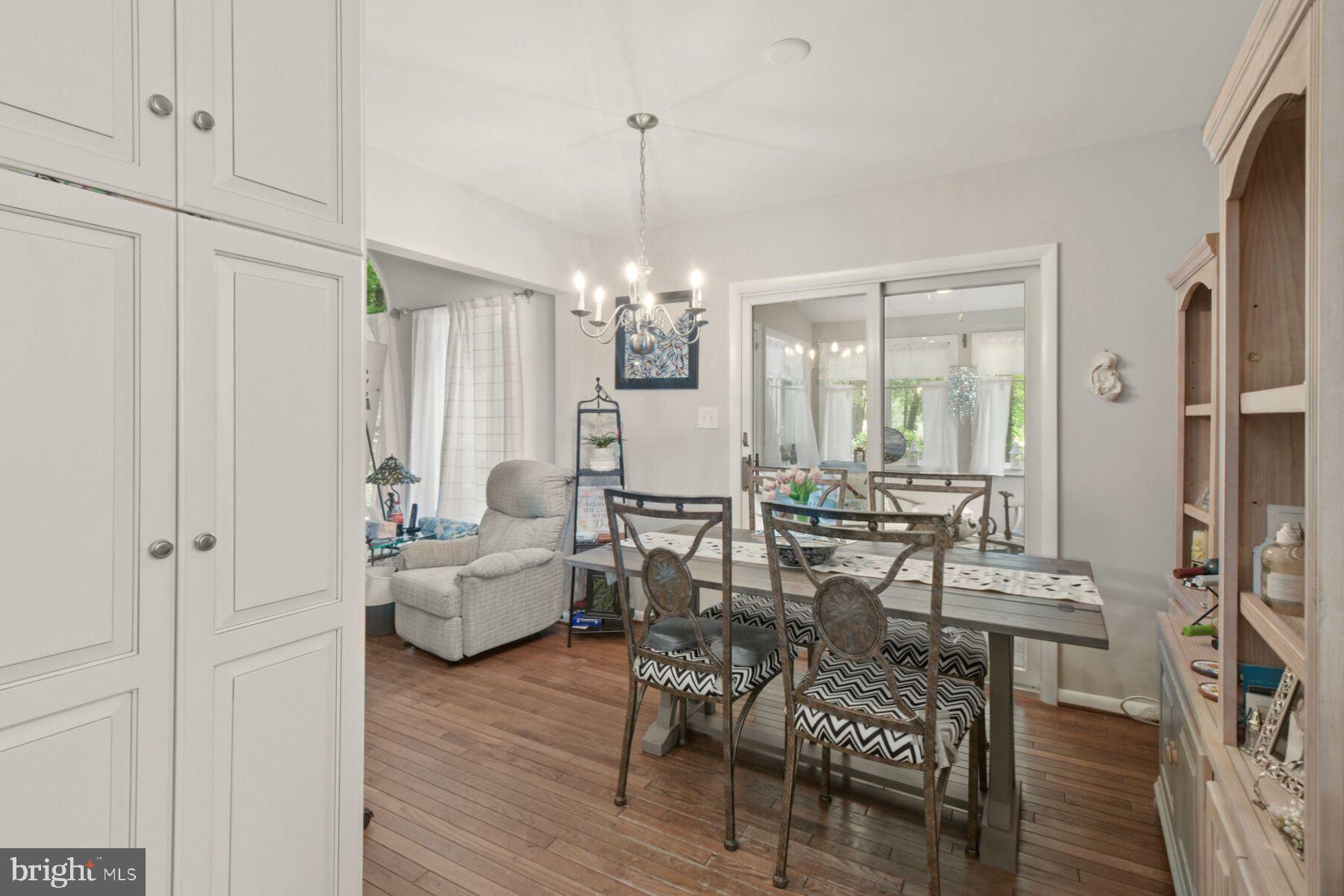 44 Beaconhill Road Ocean Pines, MD 21811 - Photo 17 of 28 a view of a dining room with furniture and wooden floor