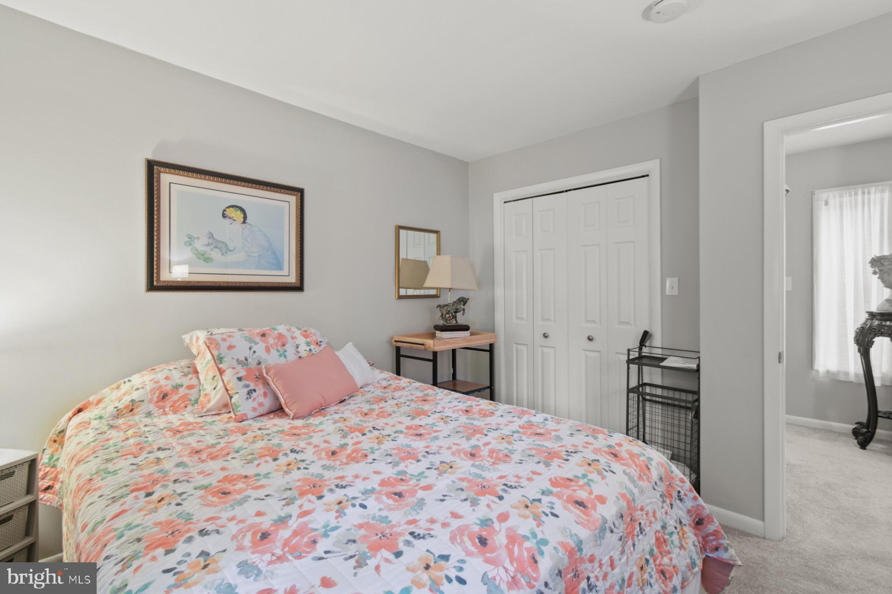 44 Beaconhill Road Ocean Pines, MD 21811 - Photo 24 of 28 a bedroom with a bed and a view of kitchen