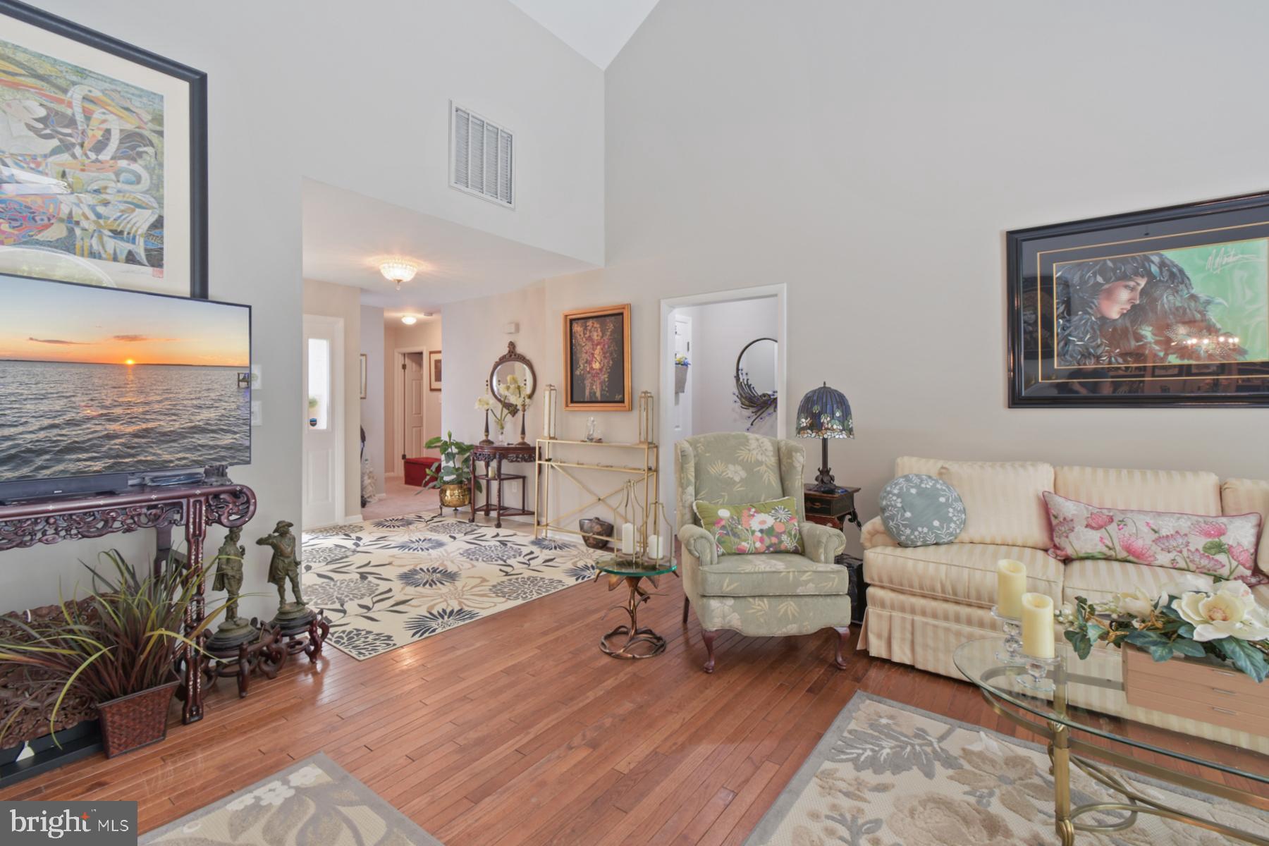 44 Beaconhill Road Ocean Pines, MD 21811 - Photo 8 of 28 a living room with furniture and wooden floor