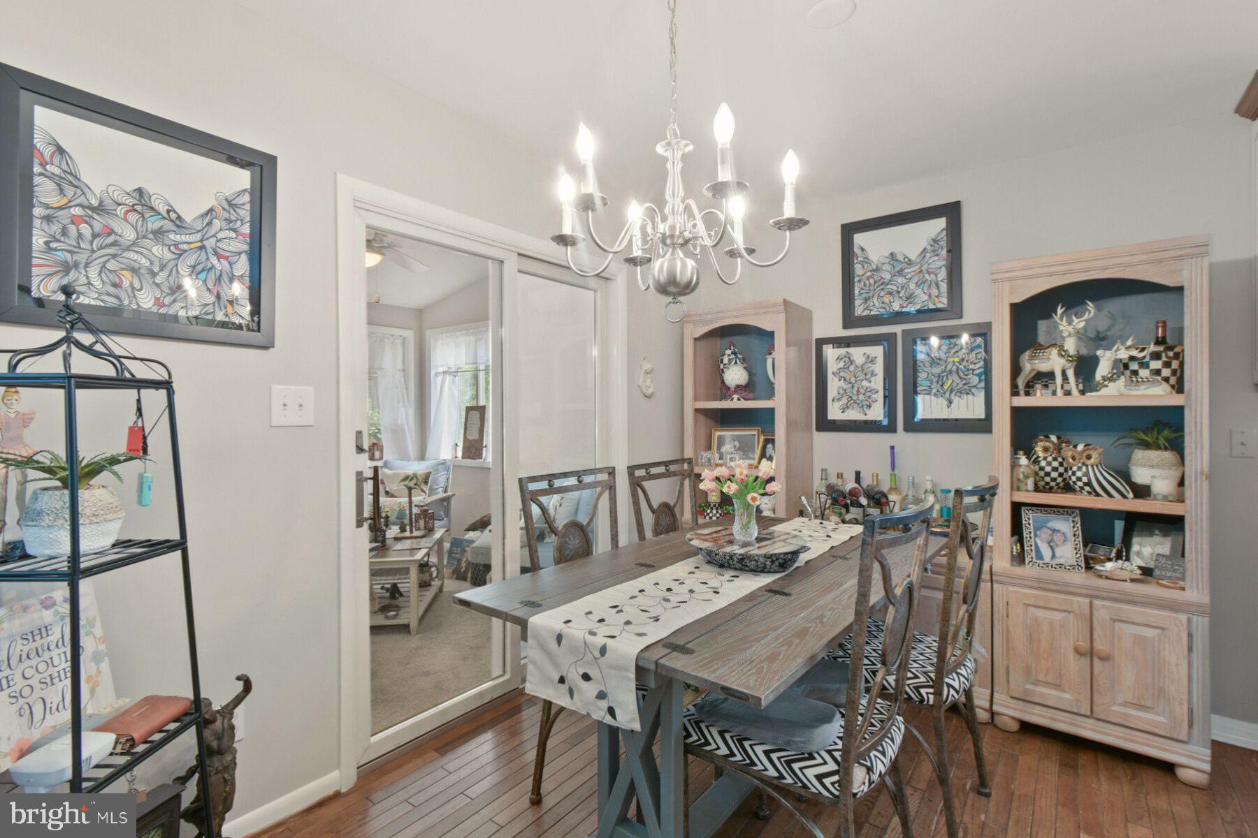 44 Beaconhill Road Ocean Pines, MD 21811 - Photo 10 of 28 a view of a dining room with furniture and wooden floor