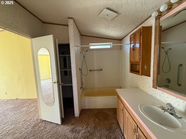 903 Cook Street Myrtle Creek, OR 97457 - Photo 12 of 20 a bathroom with a tub a sink and a large mirror