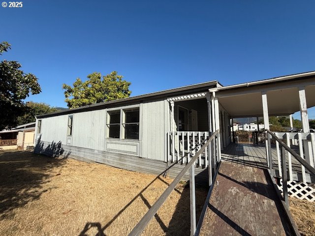 903 Cook Street Myrtle Creek, OR 97457 - Photo 18 of 20 a view of house with patio