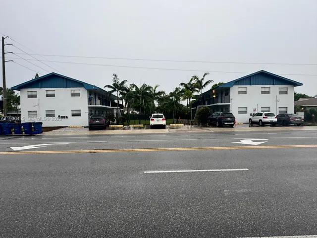 a view of car parked in front of house