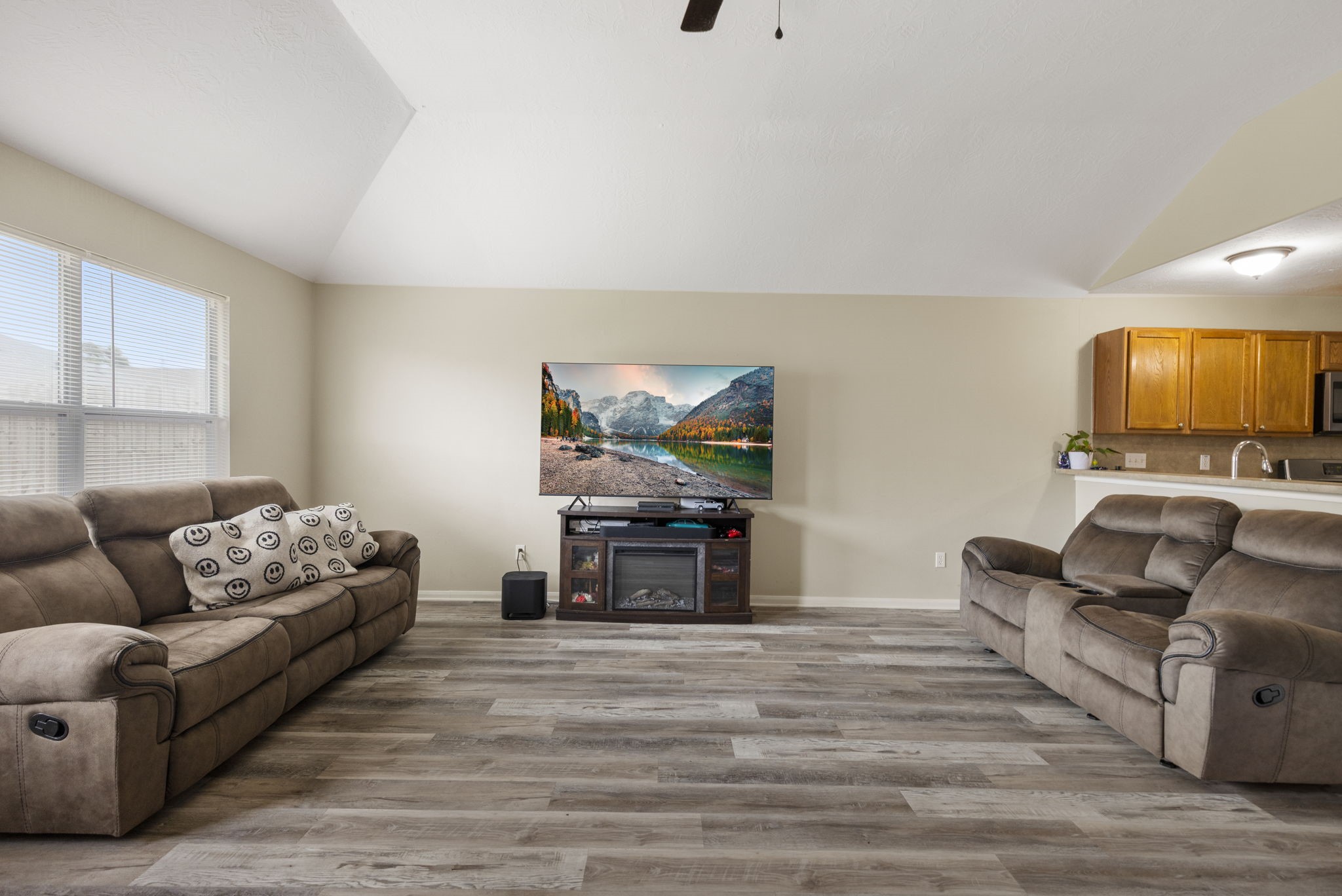 29106 Foxingham Circle Spring, TX 77386 - Photo 18 of 47 a living room with furniture and a flat screen tv