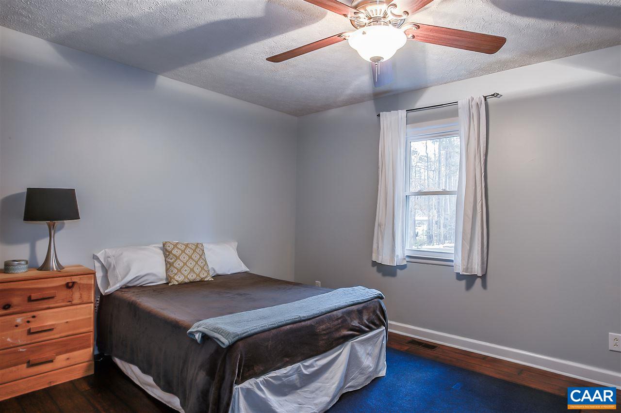 1 Dogleg Road Palmyra, VA 22963 - Photo 14 of 19 a bedroom with a bed and a window