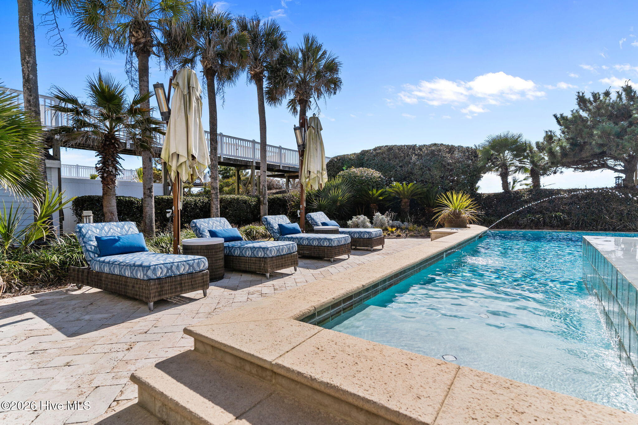 241 West First Street Ocean Isle Beach, NC 28469 - Photo 99 of 124 Mature landscaping creates a private resort feel.