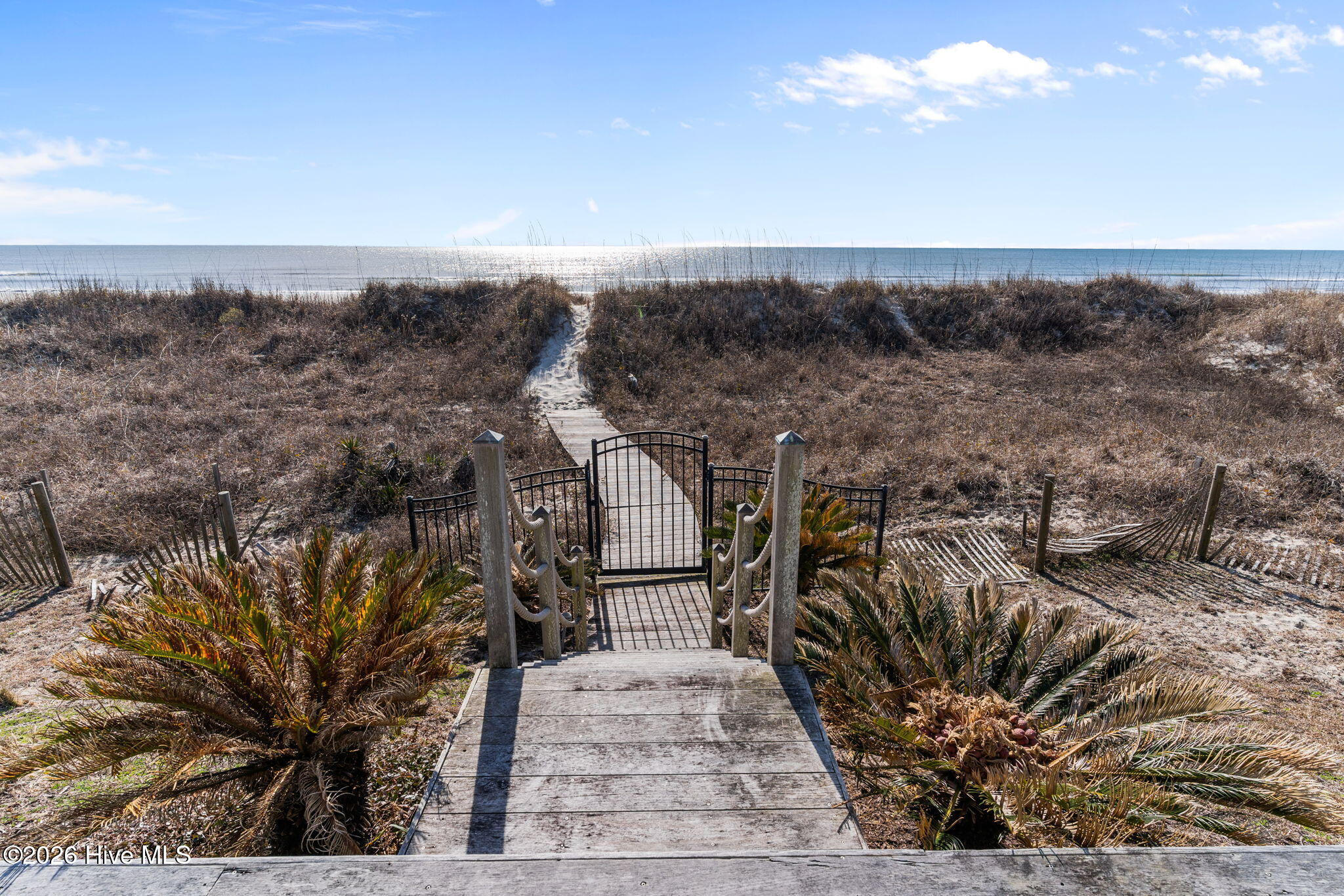 241 West First Street Ocean Isle Beach, NC 28469 - Photo 103 of 124 Path to the beach with gate.