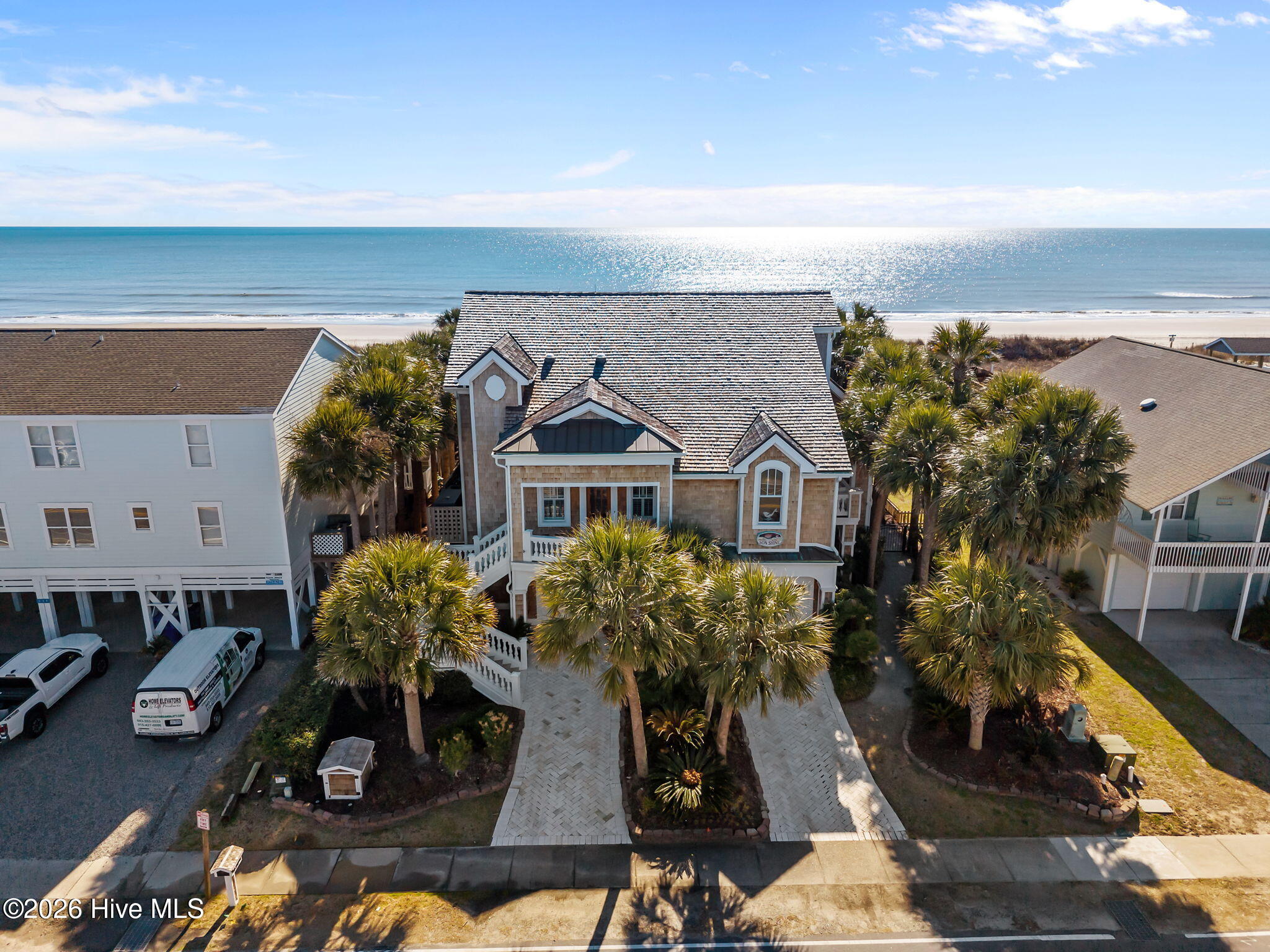 241 West First Street Ocean Isle Beach, NC 28469 - Photo 117 of 124 An iconic location surrounded by lush palms.