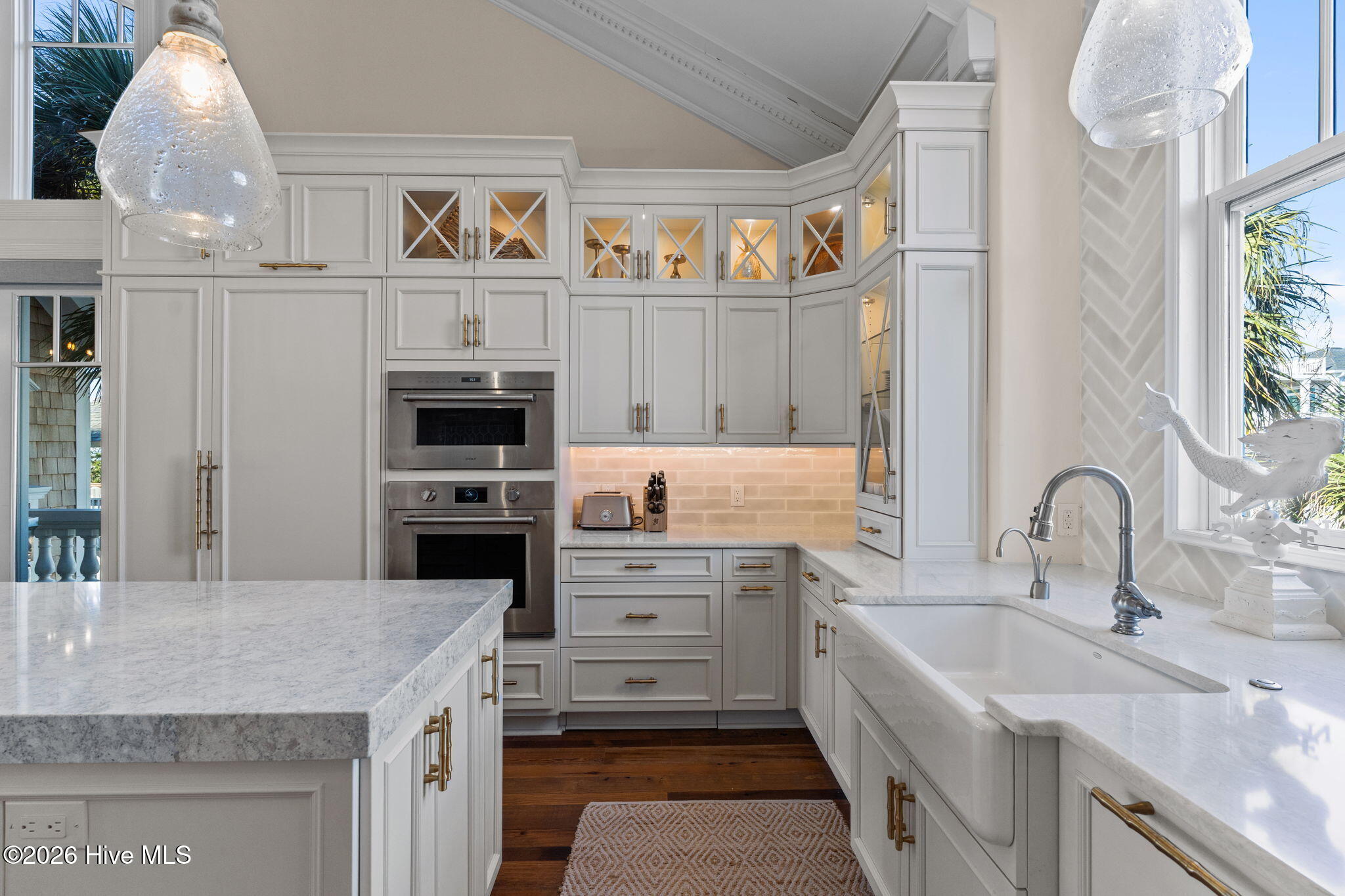 241 West First Street Ocean Isle Beach, NC 28469 - Photo 34 of 124 Tile backsplash, stylish pendant lighting.