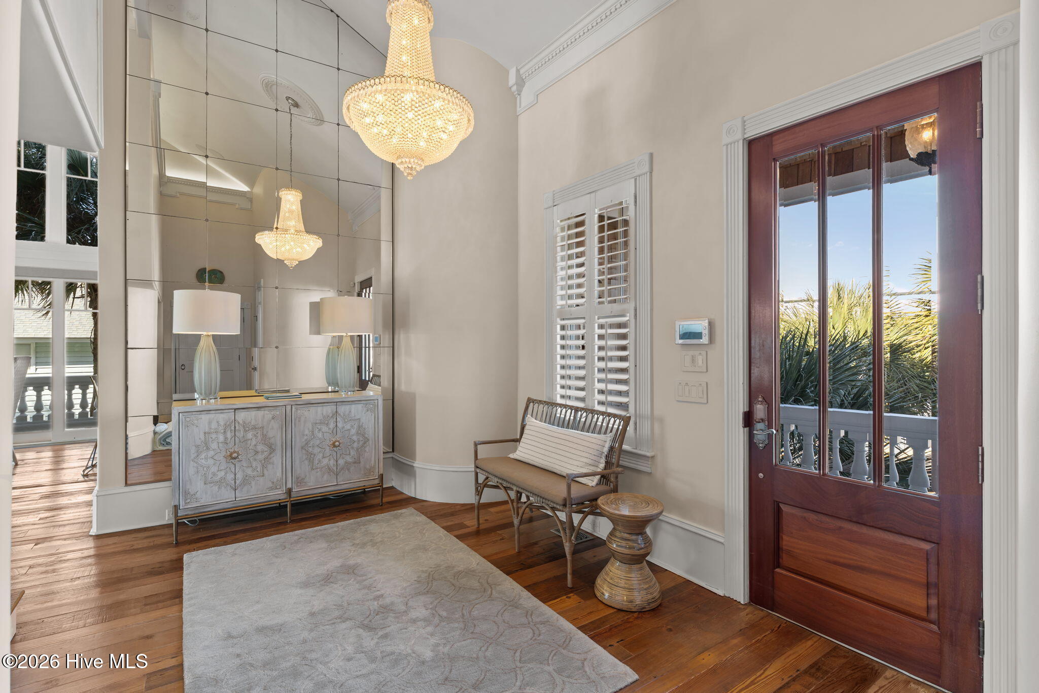 241 West First Street Ocean Isle Beach, NC 28469 - Photo 42 of 124 Foyer with stunning chandelier.