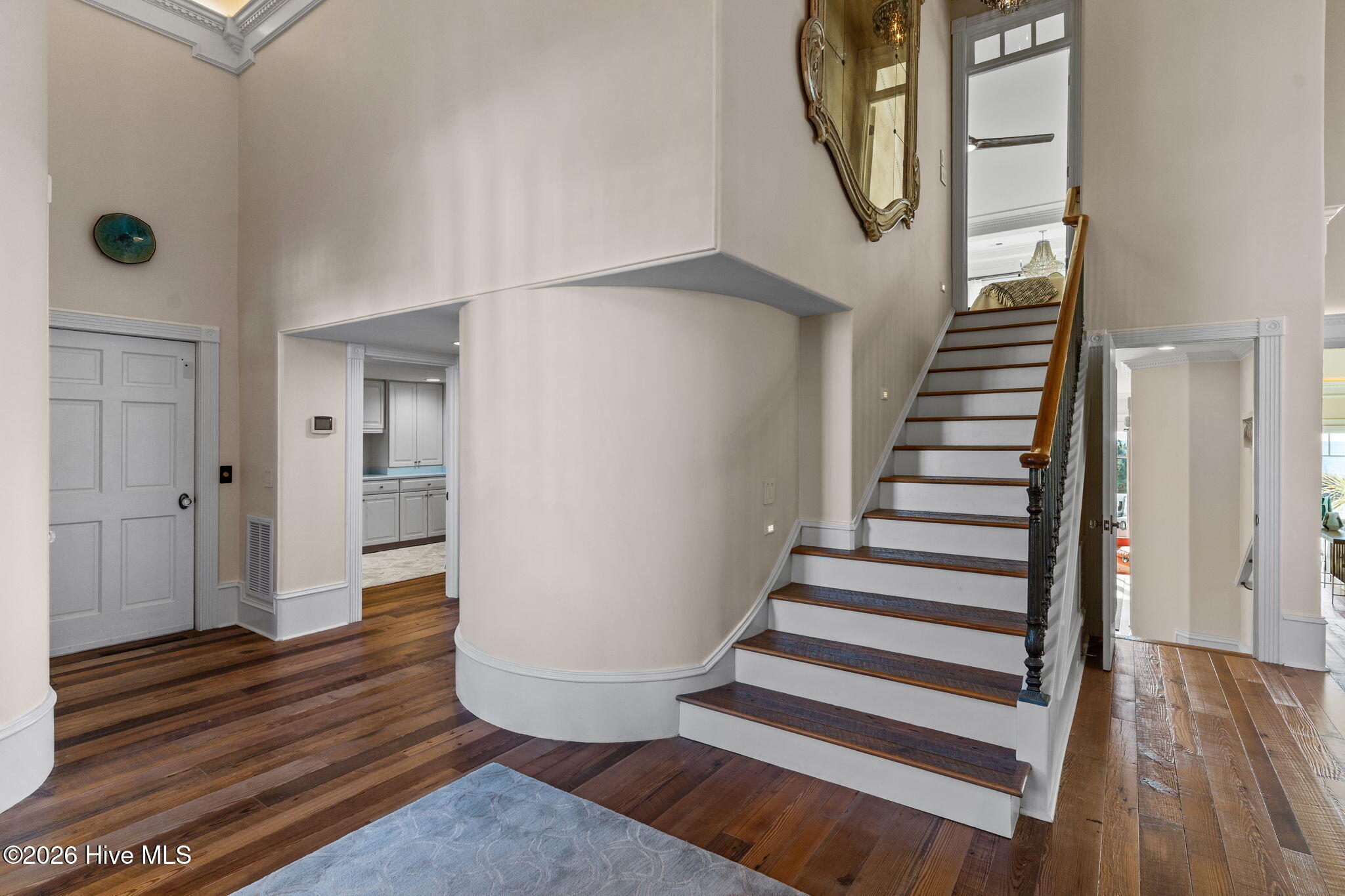 241 West First Street Ocean Isle Beach, NC 28469 - Photo 43 of 124 Staircase to primary suite, also accessible by elevator.