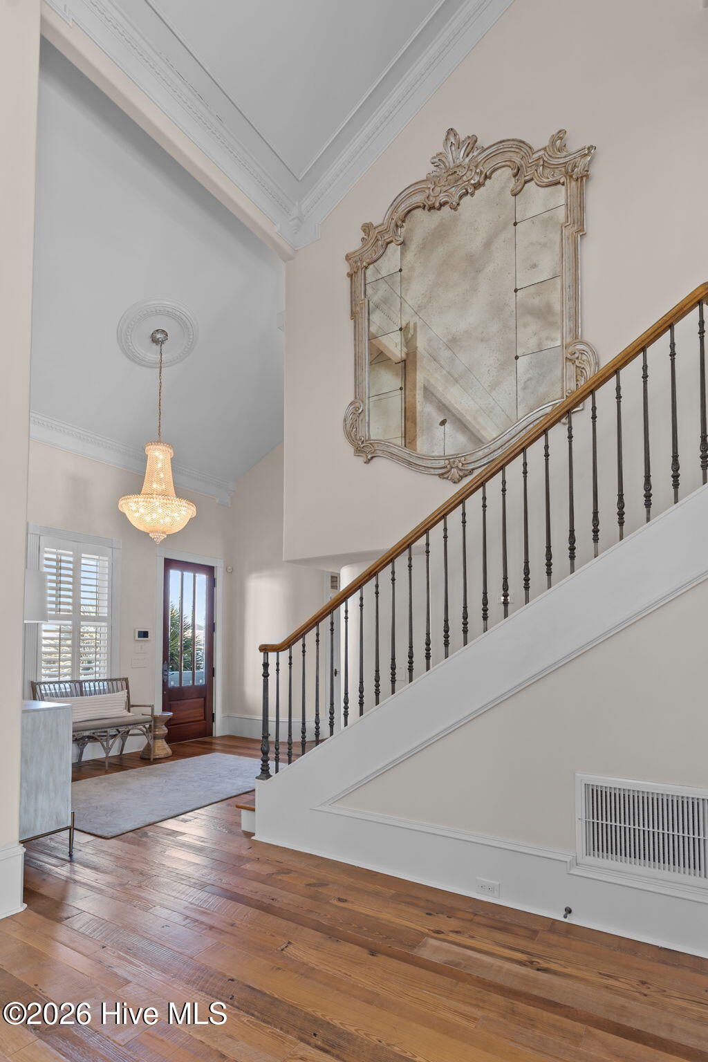 241 West First Street Ocean Isle Beach, NC 28469 - Photo 44 of 124 Staircase to primary suite.