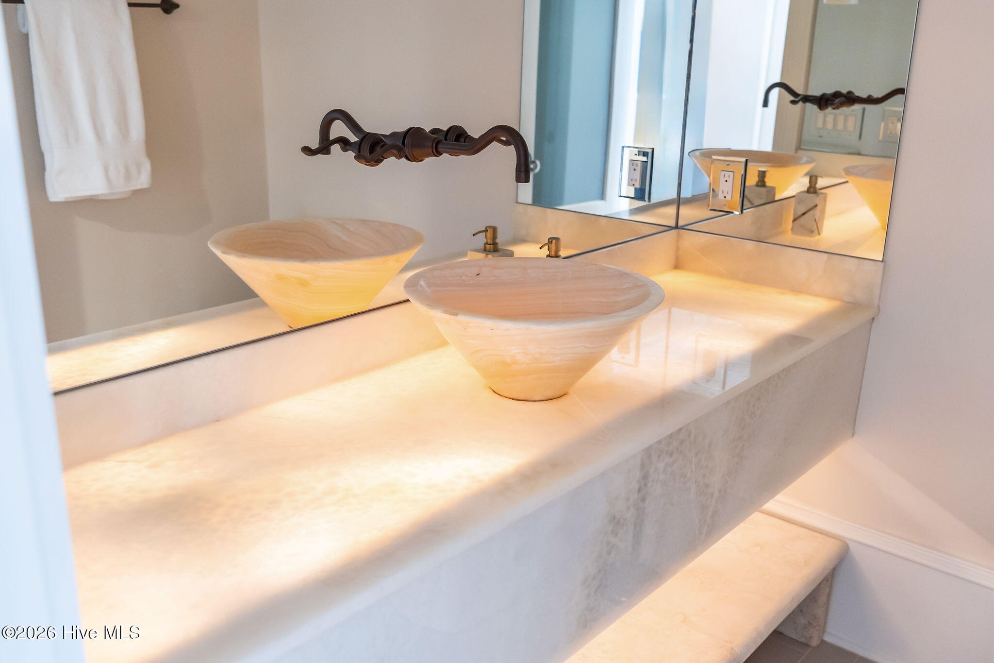 241 West First Street Ocean Isle Beach, NC 28469 - Photo 73 of 124 Bedroom 2 en suite bathroom with quartz countertop and accent lighting.