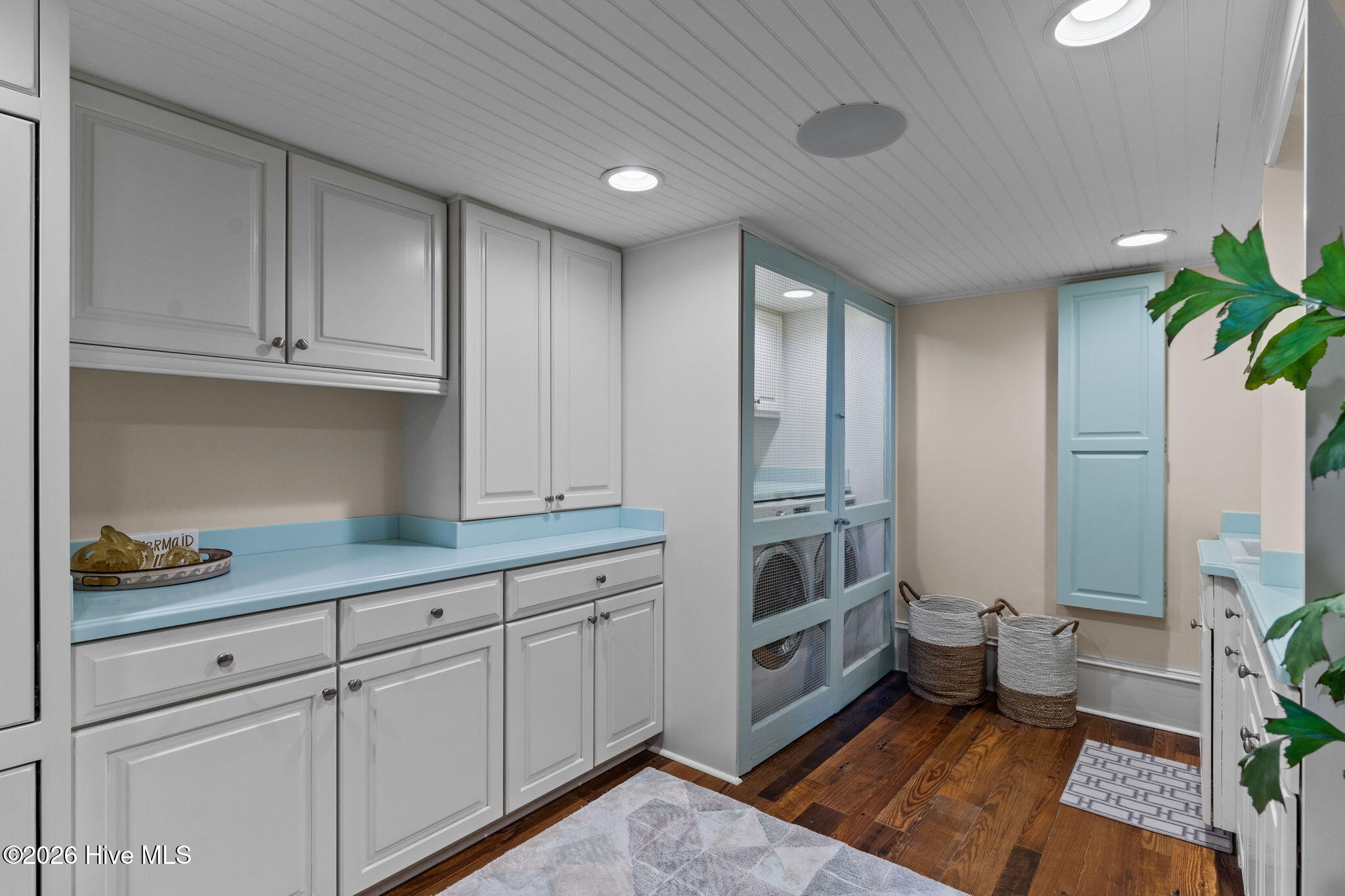 241 West First Street Ocean Isle Beach, NC 28469 - Photo 80 of 124 Large laundry/utility room with storage, sink.