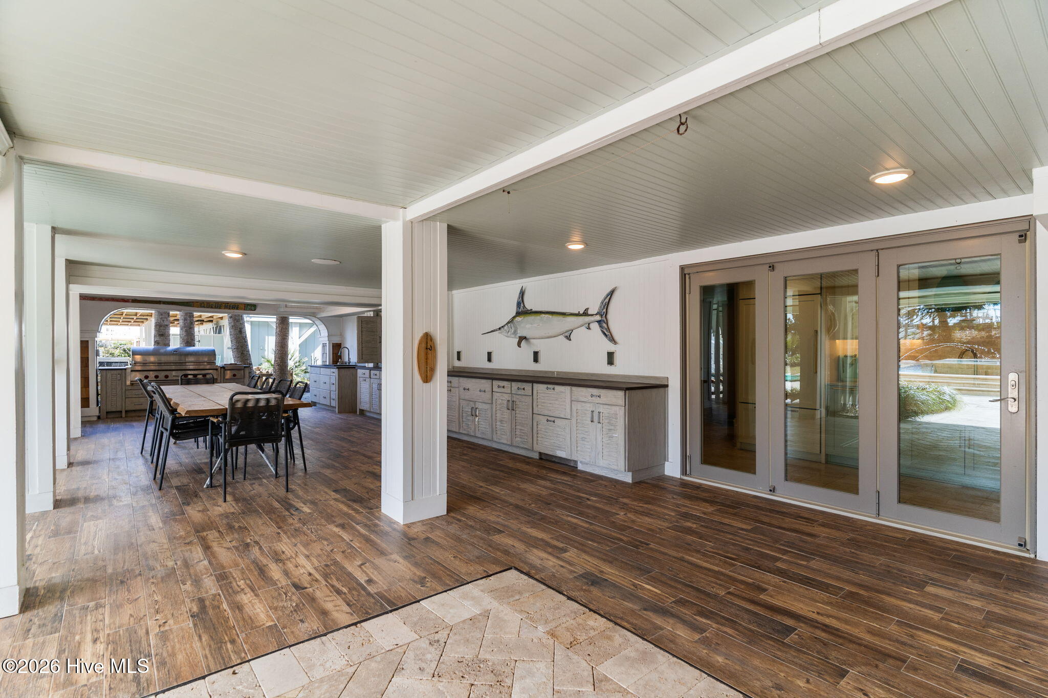 241 West First Street Ocean Isle Beach, NC 28469 - Photo 88 of 124 Under home entertainment space. Recessed lighting, built in cabinets, beadboard ceilings.