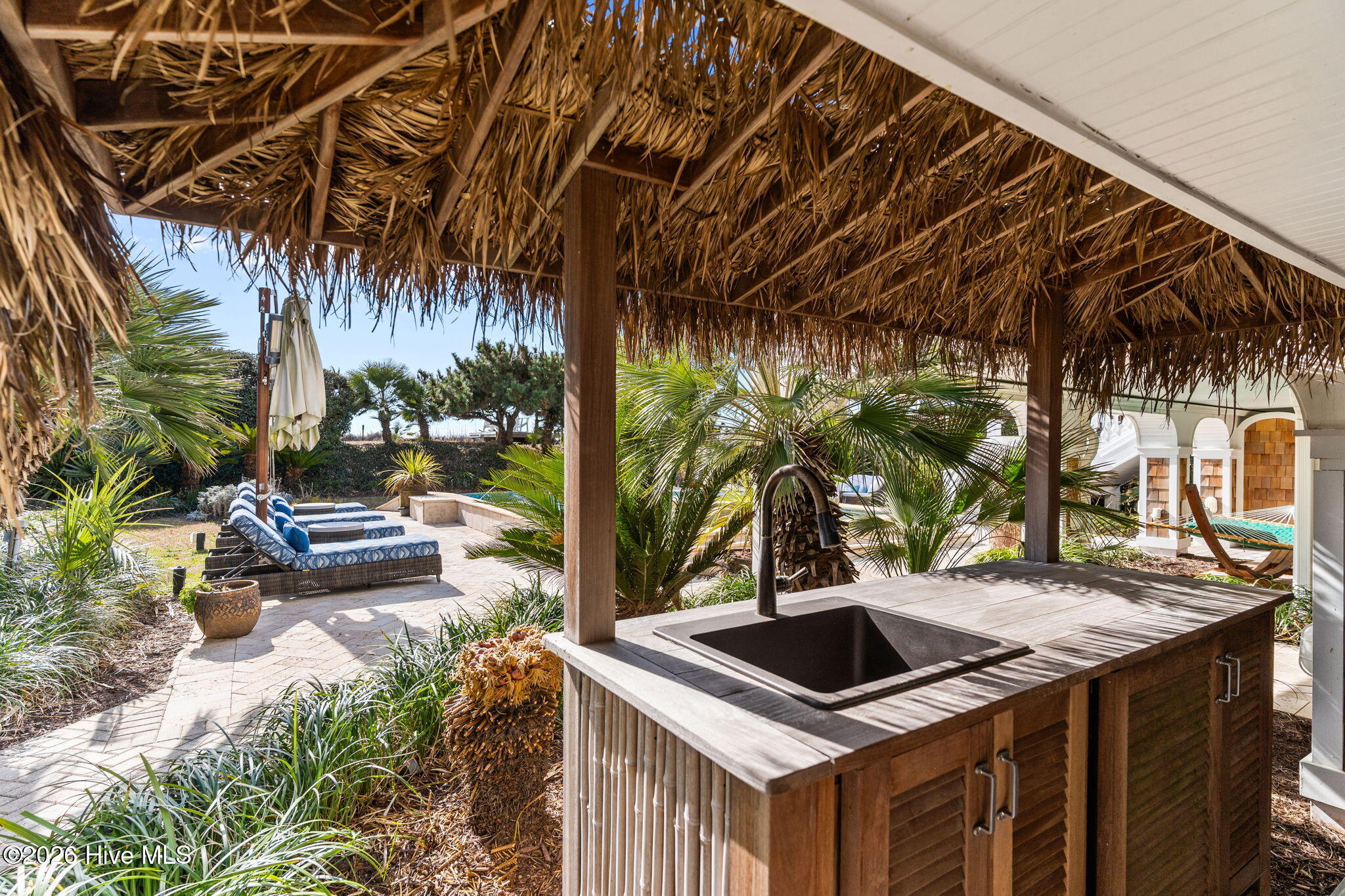 241 West First Street Ocean Isle Beach, NC 28469 - Photo 92 of 124 Tiki bar overlooking the pool.