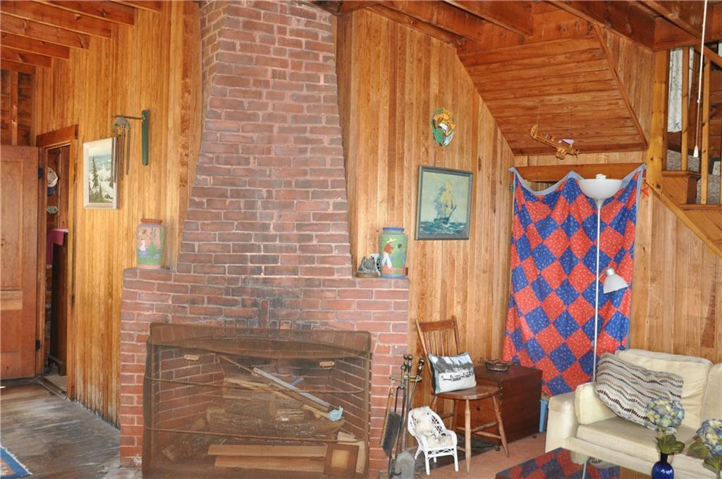 125 Long Cove Point Road Bristol, ME 04564 - Photo 5 of 6 Unique corner fireplace rather...