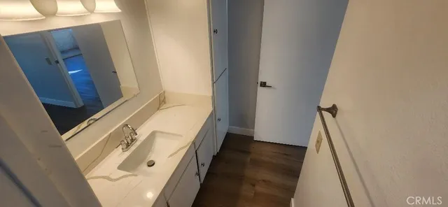 a view of a swimming pool with an outdoor seating