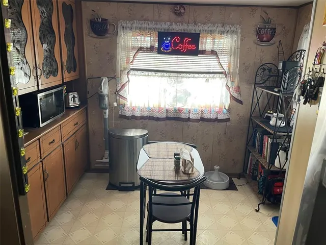 a room with furniture and a window