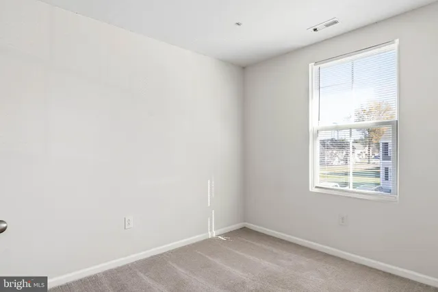 a view of a kitchen with closet area