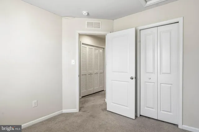 a bathroom with a sink toilet and vanity
