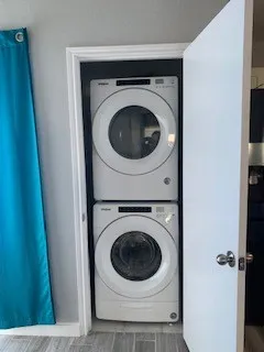 a utility room with dryer and washer
