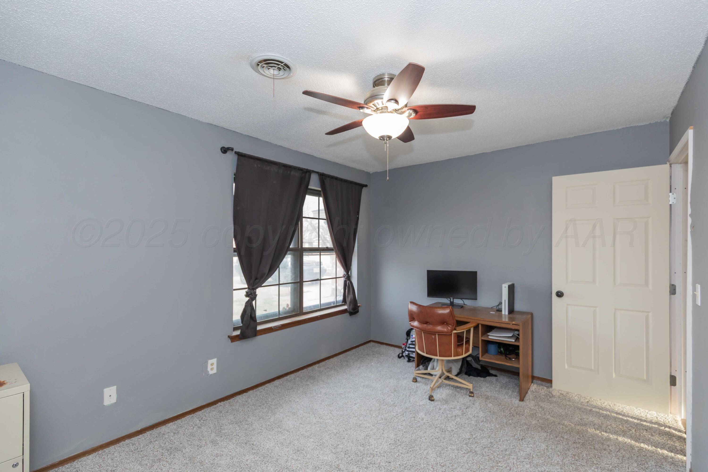 5301 Leigh Avenue Amarillo, TX 79110 - Photo 17 of 35 a view of workspace with a window