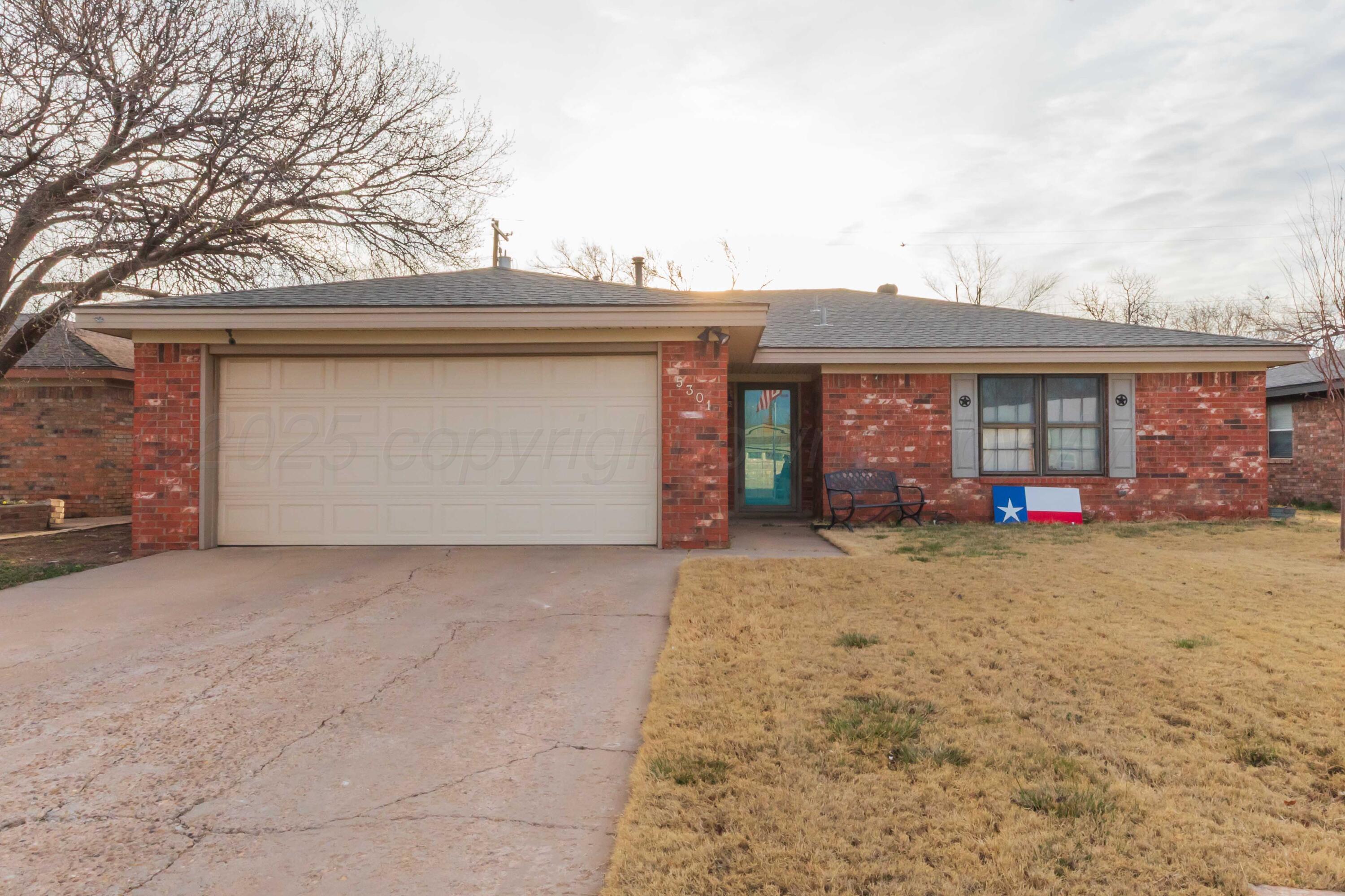 5301 Leigh Avenue Amarillo, TX 79110 - Photo 3 of 35 front view of house with a yard