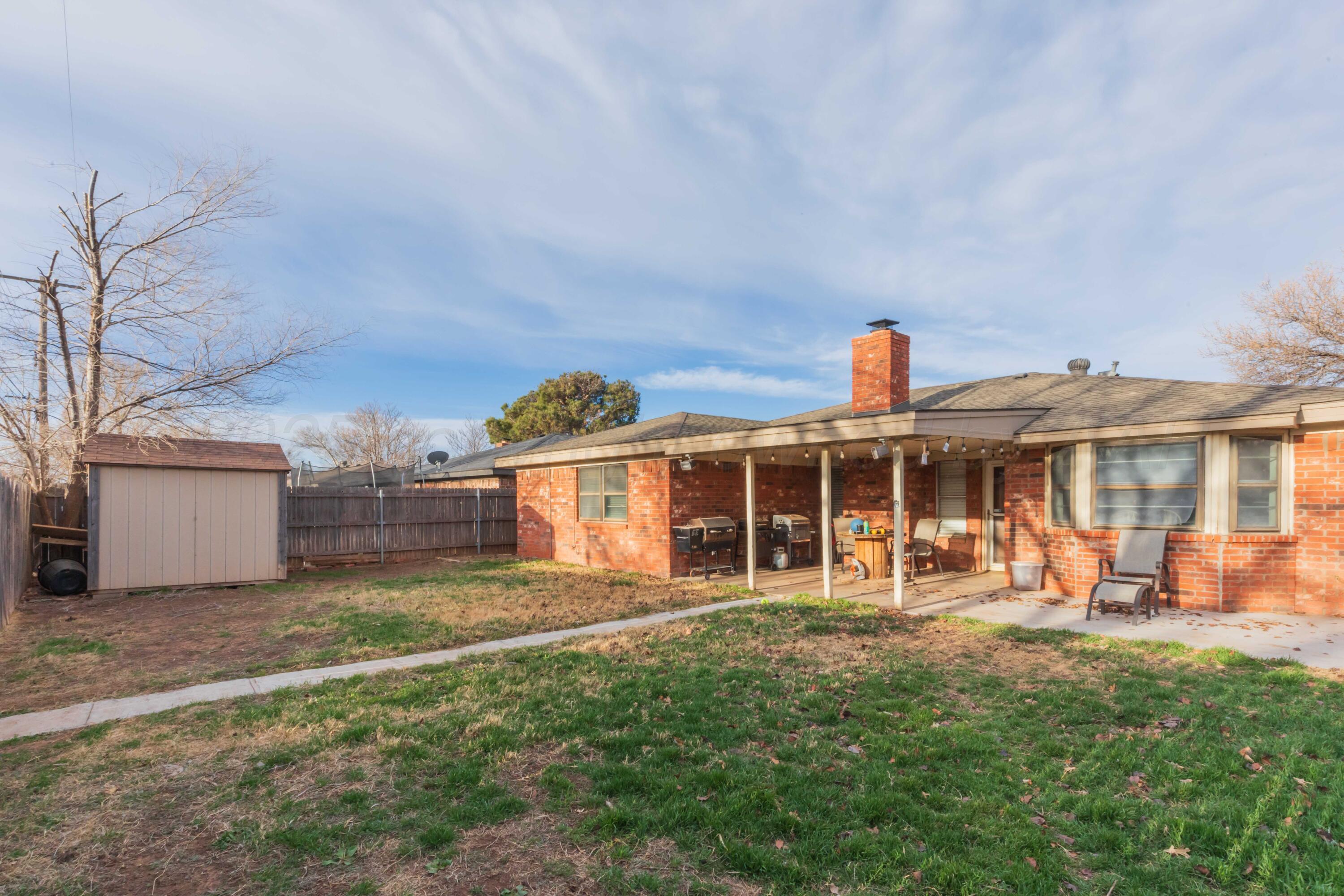 5301 Leigh Avenue Amarillo, TX 79110 - Photo 34 of 35 a view of a house with a yard and sitting area