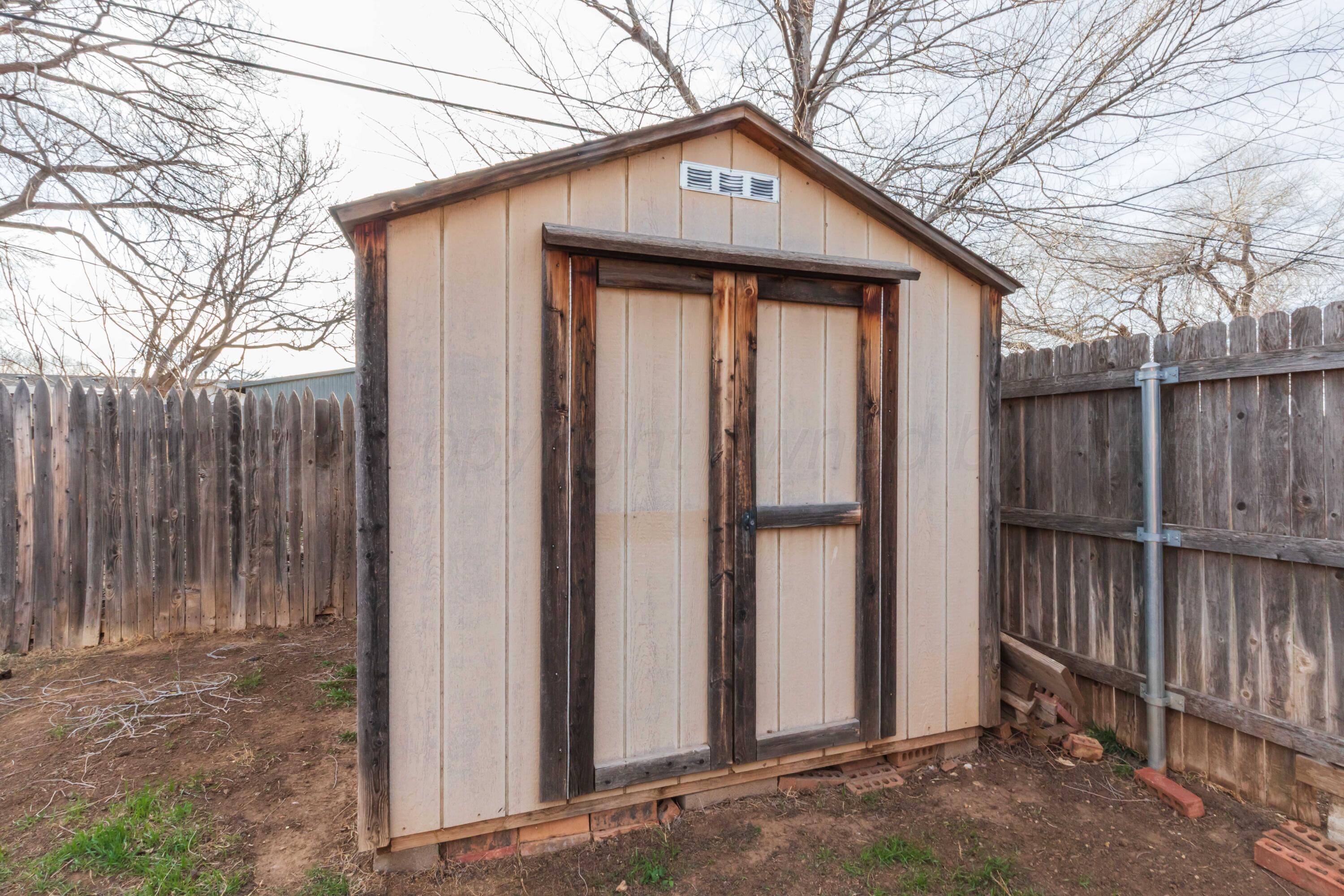 5301 Leigh Avenue Amarillo, TX 79110 - Photo 35 of 35 a front view of a house with wooden fence
